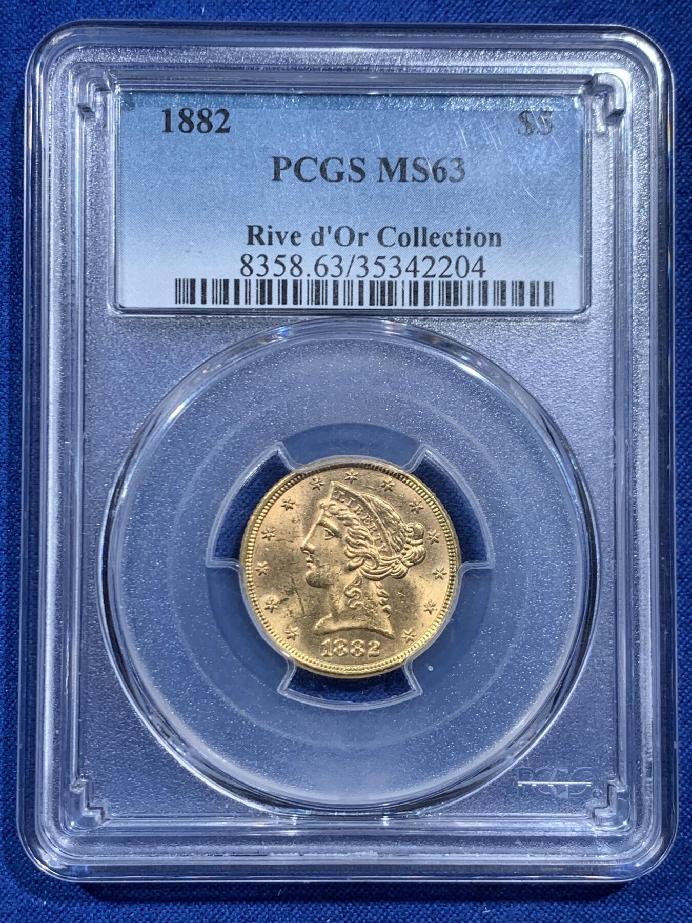 《竞宝斋》第462场 周日，周一，2场连拍 （全场包邮）欢迎送拍 PCGS MS63 美国1882年自由女神（皇冠头）5美元金币 900金 8.359克 盒子背面支撑有磕 细节见图