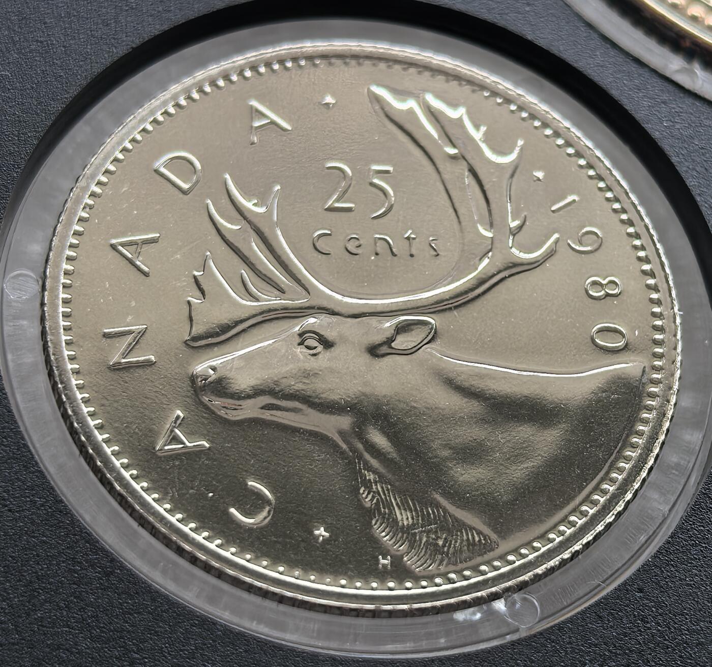 外国优质老铜币高银银币，周六九点倒数截拍，满百包邮，持续收拍 精制1980 年加拿大 25 分币，正面为伊丽莎白二世头像，背面饰北美象征驯鹿，设计经典大气。光泽温润，品相完好，是加拿大标志性辅币，属英联邦货币收藏精品，兼具历史与收藏价值。