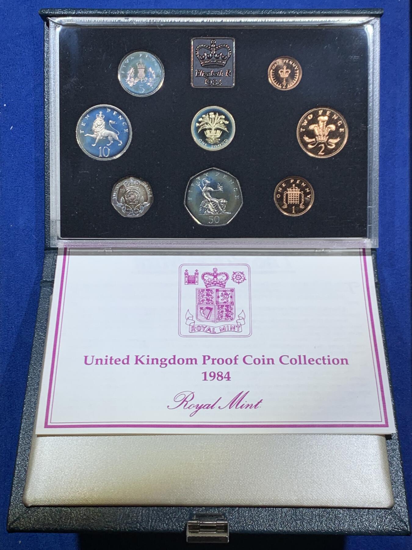 《竞宝斋》第462场 周日，周一，2场连拍 （全场包邮）欢迎送拍 英国1984年精制套币，带1枚1英镑苏格兰蓟精制纪念币，8枚币，盒证齐全，品相精美，蓝色盒装