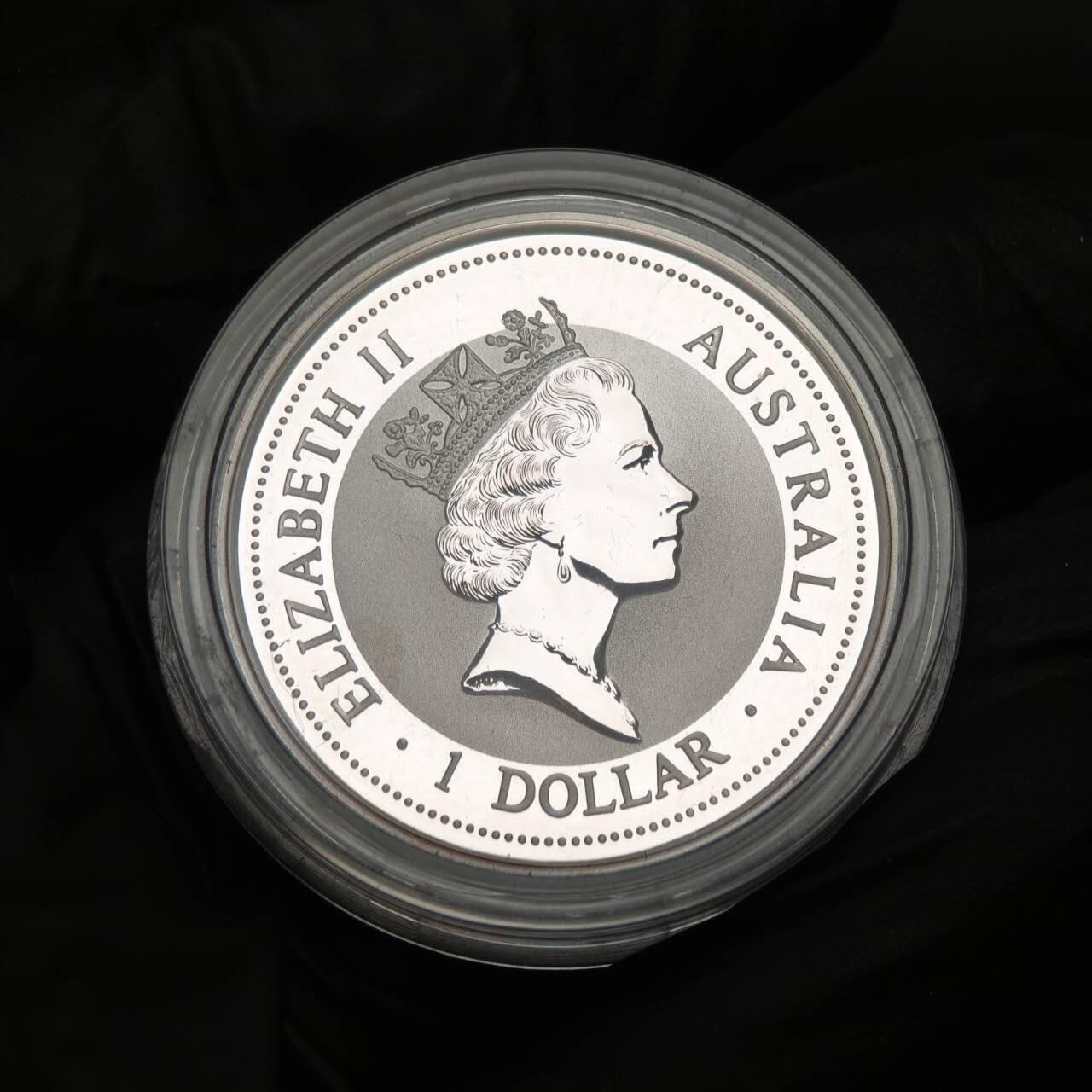 金瓯小拍第三期 古今币章 银价专场 澳大利亚镶金熊猫笑翠鸟银币1997年 重0.5克金31.1克银直径 证书编号02022 背面有一处硫化斑