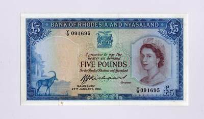 徐霞客拍卖首拍 - 罗得西亚和尼亚萨兰	P-22b 1961年5镑	Y/9 091695 品相如图 该联邦是英国在非洲东南部建立的短暂殖民联合体（1953–1963年），仅在1956–1963年间流通，联邦解体后，三个成员国各自独立并发行了本国货币，因此这批纸币的流通周期极短。正面印有伊丽莎白二世肖像。是“英属中非联邦最后的货币遗产”，仅发行7年即退出历史舞台。真正的大珍品 极其难见				