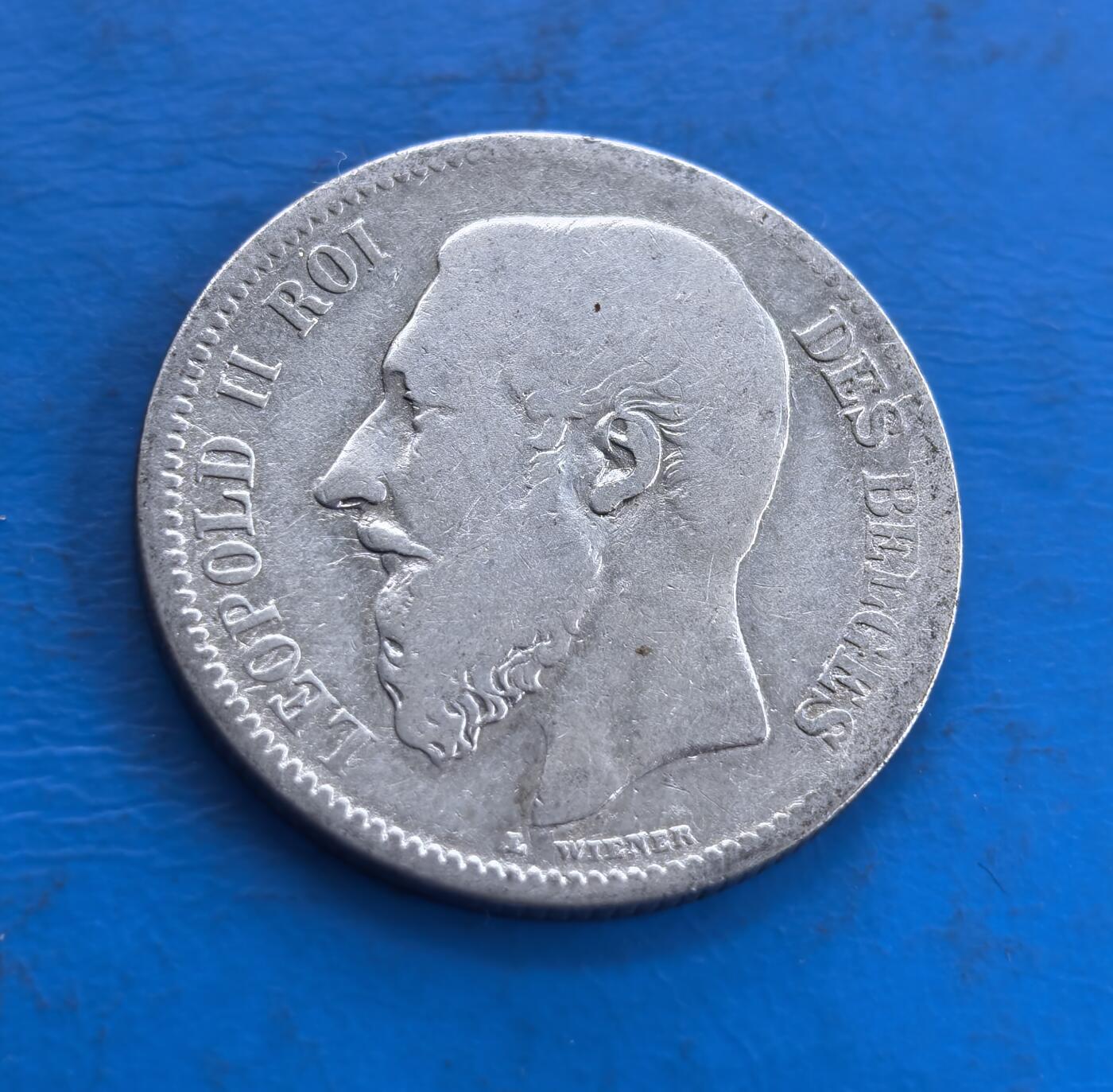 外国优质老铜币高银银币，周六九点倒数截拍，满百包邮，持续收拍 比利时1868年2 法郎银币，正面利奥波德二世头像雕刻细腻，胡须与面部轮廓传神；背面国徽雄狮威严，格言醒目，年份与面值规整，银币包浆古朴，纹饰与文字融合尽显钱币艺术魅力。