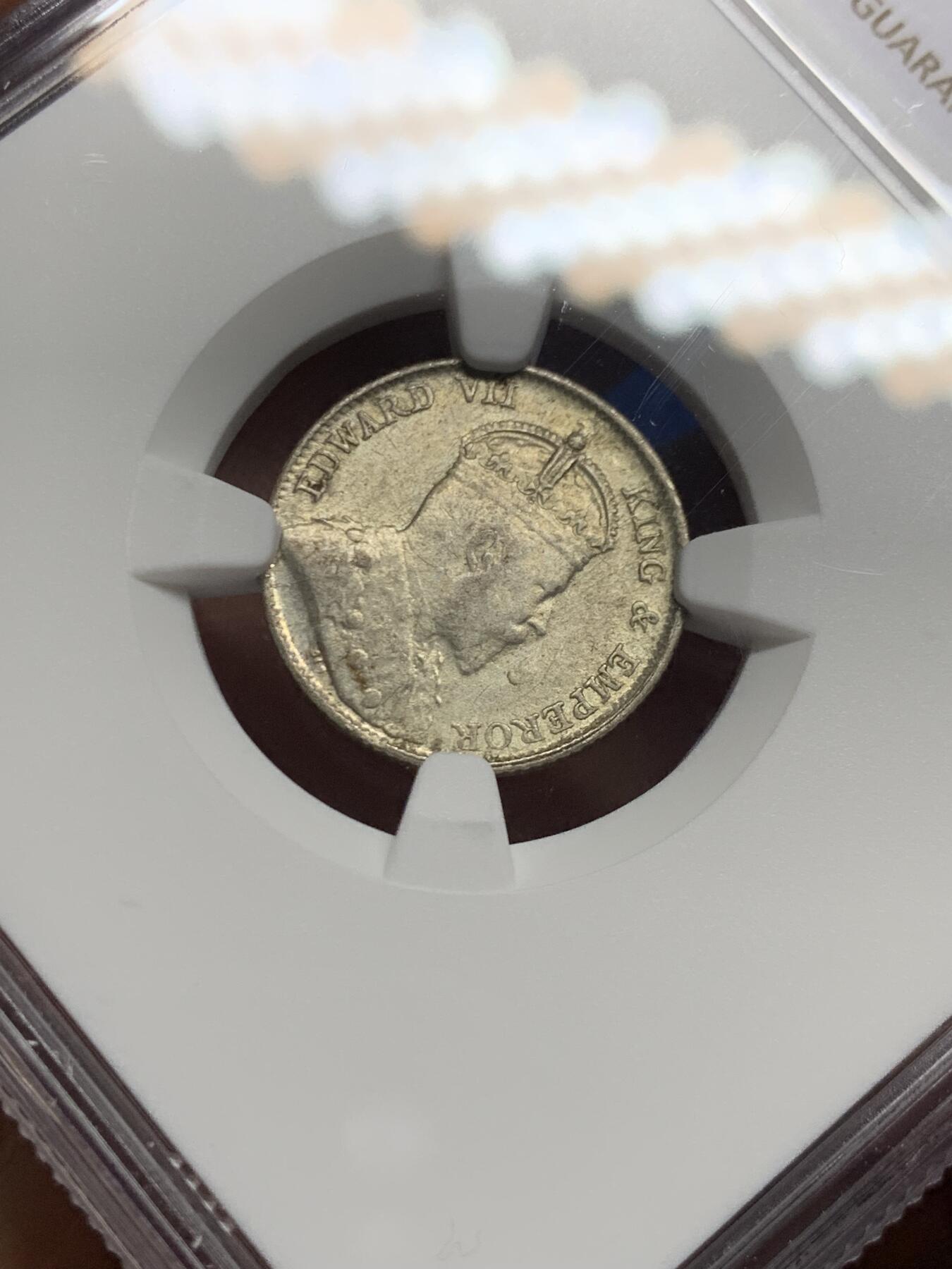 《竞宝斋》第462场 周日，周一，2场连拍 （全场包邮）欢迎送拍 NGC AU58 英属海峡1910年B版十分，早期海峡的价格外拍都很高，这种状态不错了