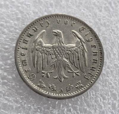 外国优质老铜币高银银币，周六九点倒数截拍，满百包邮，持续收拍 - 德国1934年1马克A版，正面铸纳粹帝国鹰与 “公共利益先于个人利益” 铭文，A 版柏林造币厂；背面为 “德意志帝国”、面值及橡树叶。属纳粹德国初期，是希特勒上台后，纳粹意识形态与货币结合的实物见证