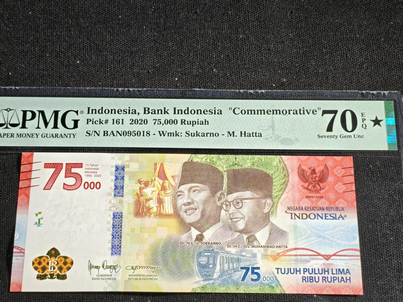 刘世昌艺术品销售中心～虎踞龙蟠*金杨在线联拍群第516期 印度尼西亚2020年“建国75周年”7万5千卢比纪念钞（PMG 70*E  号码：BAN095018）1枚。