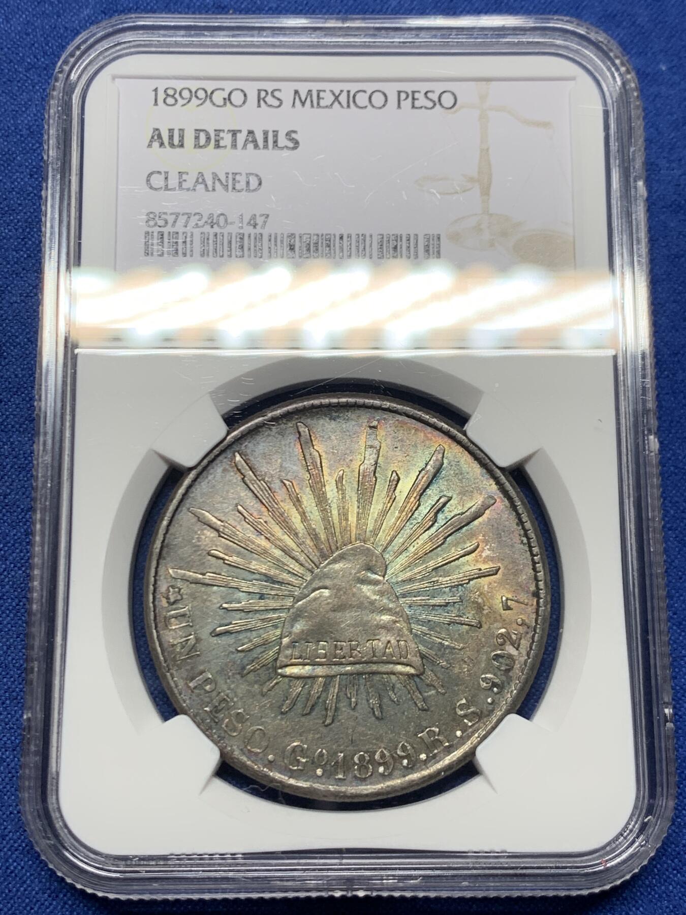 《竞宝斋》第462场 周日，周一，2场连拍 （全场包邮）欢迎送拍 NGC AUD 墨西哥1899年GORS版比索银币，五彩转光，非常漂亮的彩和状态，不理解为啥没分，可以尝试重评