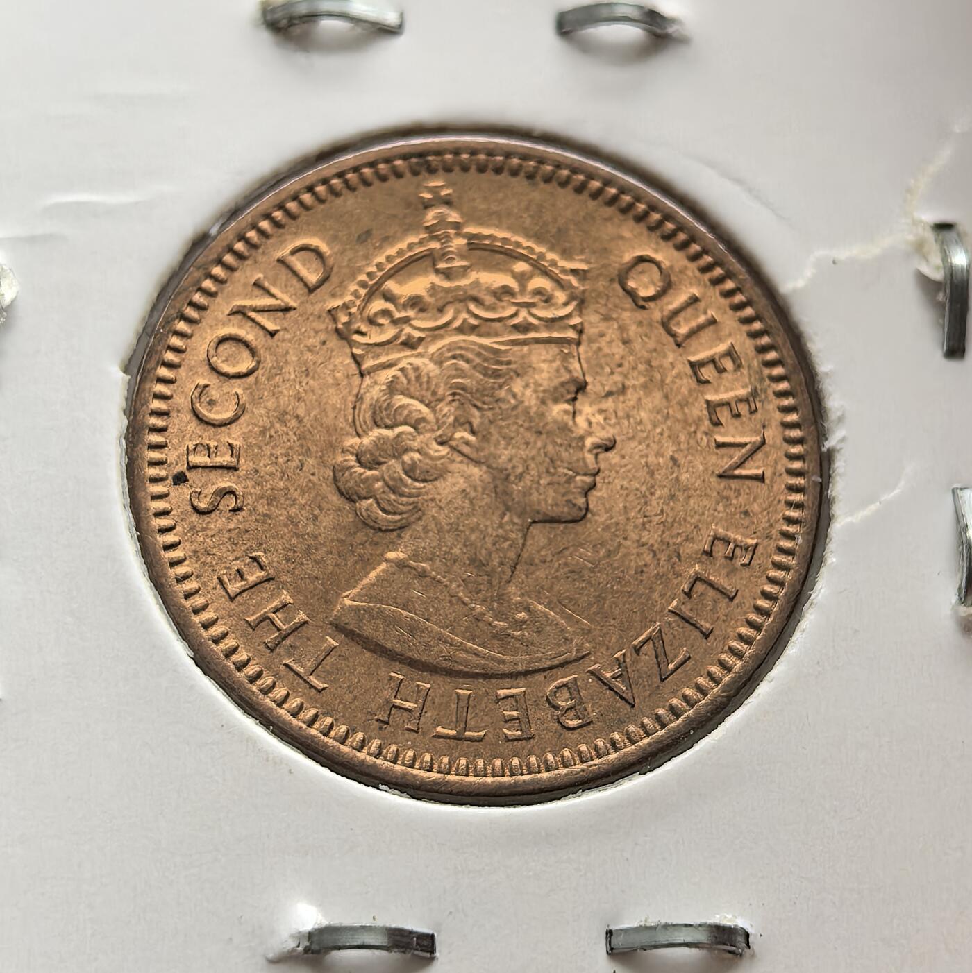 外国优质老铜币高银银币，周六九点倒数截拍，满百包邮，持续收拍 英属东加勒比1955 年 1/2 分铜币，正面为伊丽莎白二世头像，背面铸面值与属地名称，属英联邦殖民时期货币。铜质包浆温润，品相完好，设计经典，见证殖民货币史，是英属加勒比货币收藏的特色佳品，历史与收藏价值兼具。