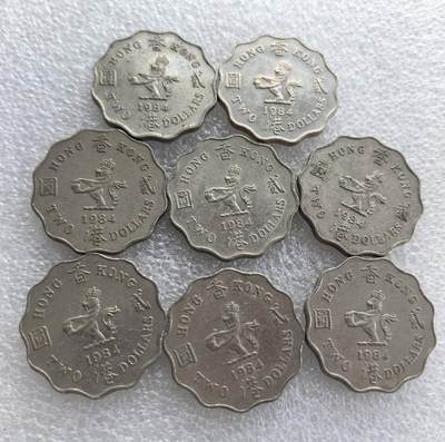 外国优质老铜币高银银币，周六九点倒数截拍，满百包邮，持续收拍 - 1984 年香港发行的贰圆8枚，采用十二边形独特形制。正面为伊丽莎白二世头像，标注 “QUEEN ELIZABETH THE SECOND”；背面铸香港狮徽、“贰圆”“HONG KONG” 及年份，属香港回归前英属时期流通辅币，是香港钱币收藏的经典品种。