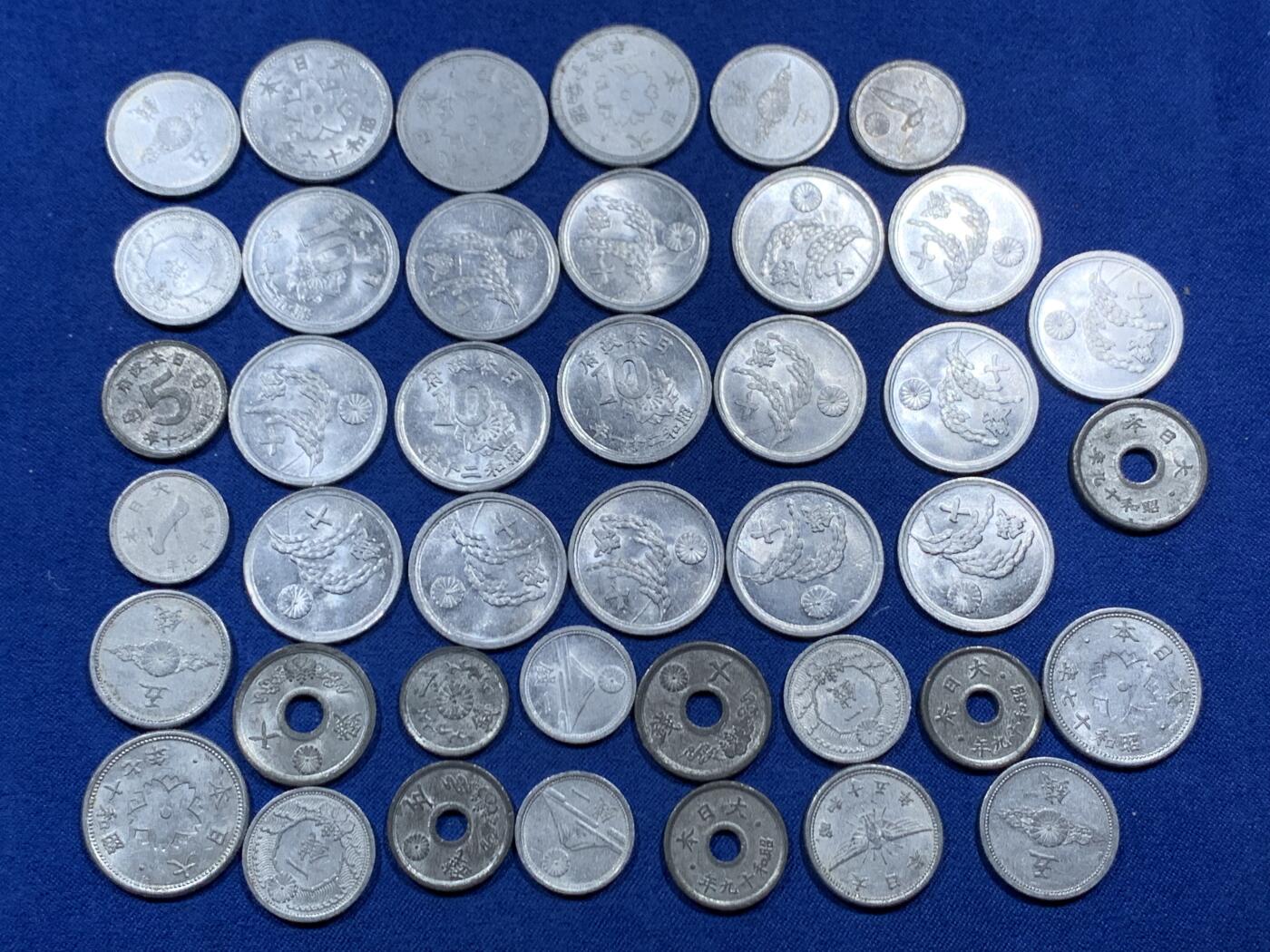 《竞宝斋》第462场 周日，周一，2场连拍 （全场包邮）欢迎送拍 日本二战时期铝币锌锡币 细节见图