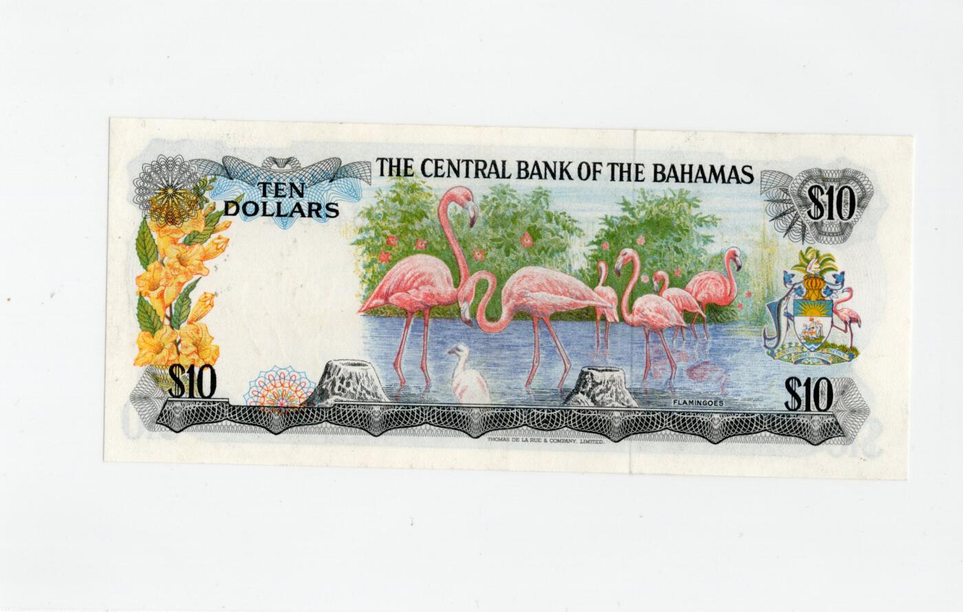 徐霞客拍卖首拍 	巴哈马群岛	P-38a 1974年10元				J645661	unc-纸币正面以伊丽莎白二世肖像为核心设计元素，体现英联邦国家的历史关联。该币是巴哈马独立后首批发行的法定货币，反映其政治转型与经济自主的进程。采用西班牙大帆船水印、精细雕刻凹印及多色套印技术防伪，背面的海洋生物与岛屿图案则展现巴哈马的自然地理特征。		