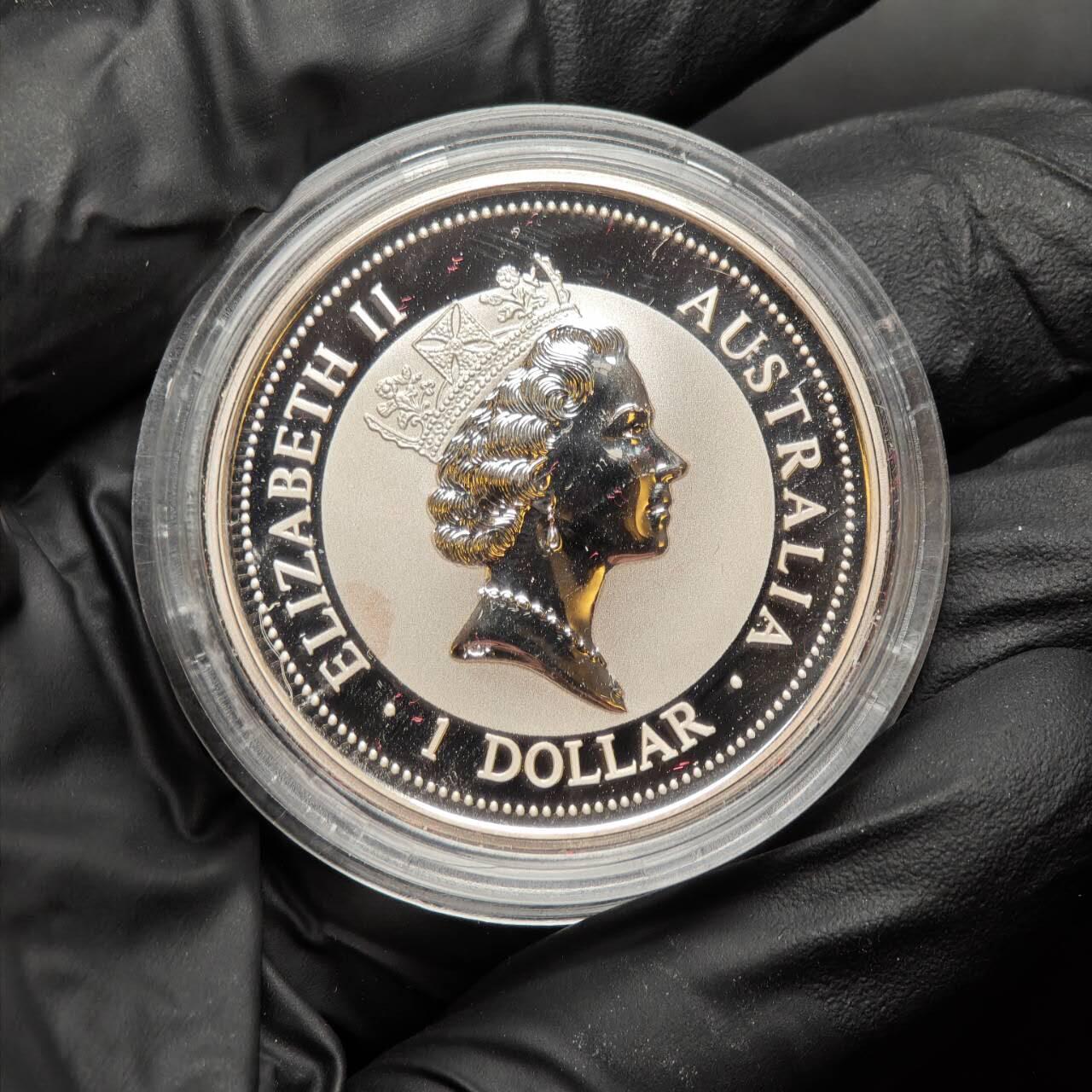 金瓯小拍第三期 古今币章 银价专场 澳大利亚镶金熊猫笑翠鸟银币1997年 重0.5克金31.1克银直径 证书编号02022 背面有一处硫化斑