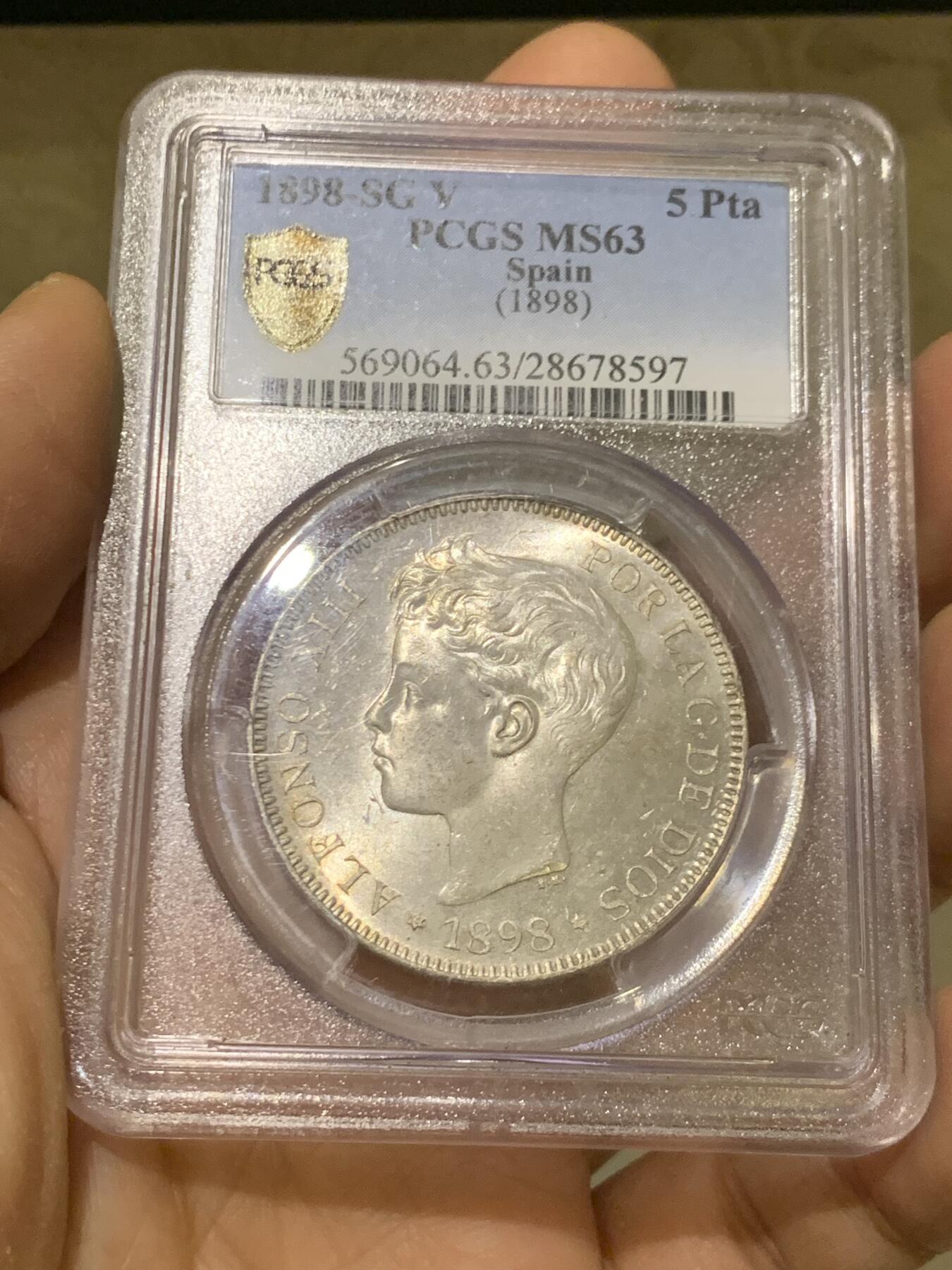 《竞宝斋》第462场 周日，周一，2场连拍 （全场包邮）欢迎送拍 PCGS MS63 西班牙 1898年 阿方索5比塞塔少年头银币 十字转光 品相上佳