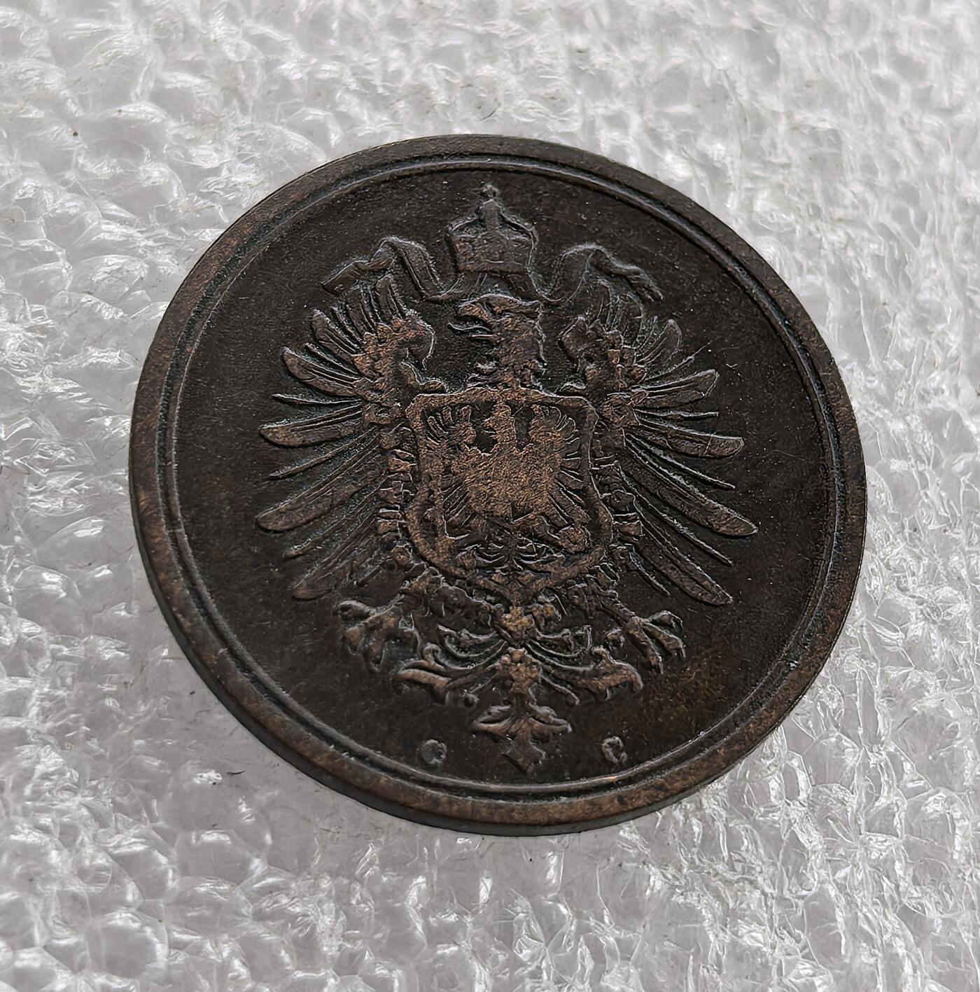 外国优质老铜币高银银币，周六九点倒数截拍，满百包邮，持续收拍 德国1875 年 1 芬尼C版，正面铸 “DEUTSCHES REICH”、面值与年份，背面为带皇冠的德意志帝国鹰。属德意志第二帝国初期，是 1871 年德国统一后推行统一币制、彰显帝国权威的流通辅币见证。