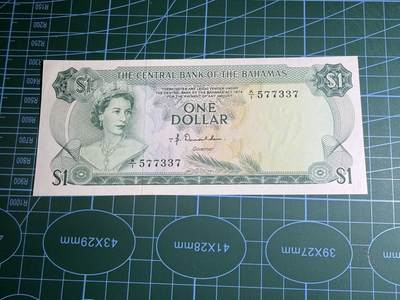 【炜奕收藏】，第五十八期，英属第三场 - 1974年巴哈马1元，UNC品相，号码无4，彩背