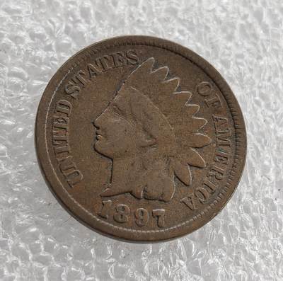 外国优质老铜币高银银币，周六九点倒数截拍，满百包邮，持续收拍 - 美国1897 年印第安人 1 分铜币，正面铸印第安人头像与国名，背面盾牌配麦穗环绕 “ONE CENT”，是美国分币早期经典款，百年包浆醇厚、品相完整，历史底蕴浓郁，是入门收藏的优选佳品。