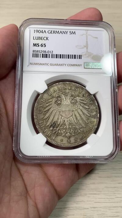 万国钱币拍卖第060期（万国六十期纪念大拍） NGC MS65 1904德国吕贝克长翅流通5马克银币 自由市名誉品种 开门年份 发行量仅一万枚 原味欧陆五彩BU品质 经典双头鹰设计 越来越难的典藏级品质