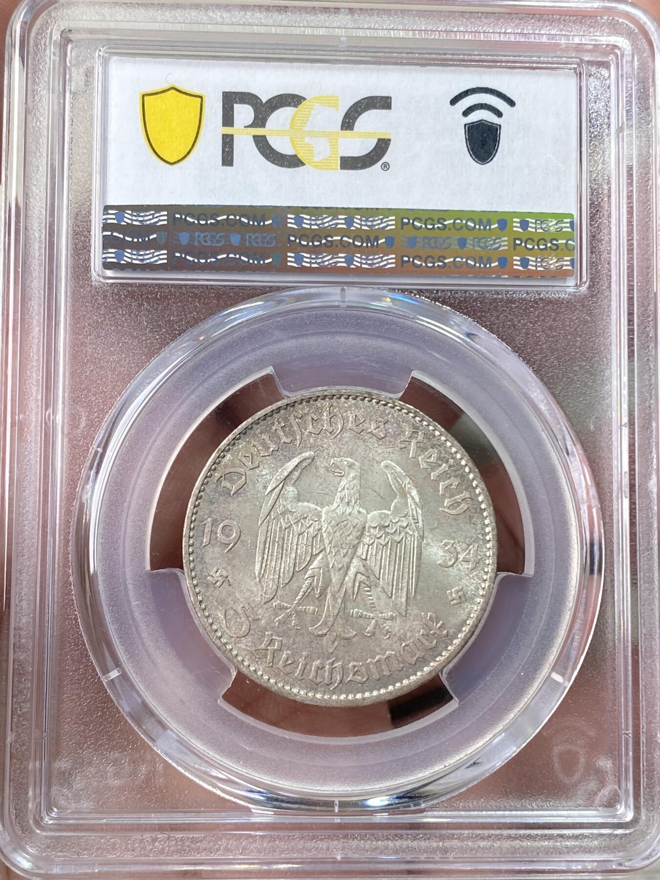 万国钱币拍卖第060期（万国六十期纪念大拍） PCGS MS65 1934德国社会主义工人党时期波茨坦教堂无字5马克银币 海量进入流通品种 丝绸转光地板 德式淡彩环绕 万里挑一的顶级BU品质 PC唯一冠军分