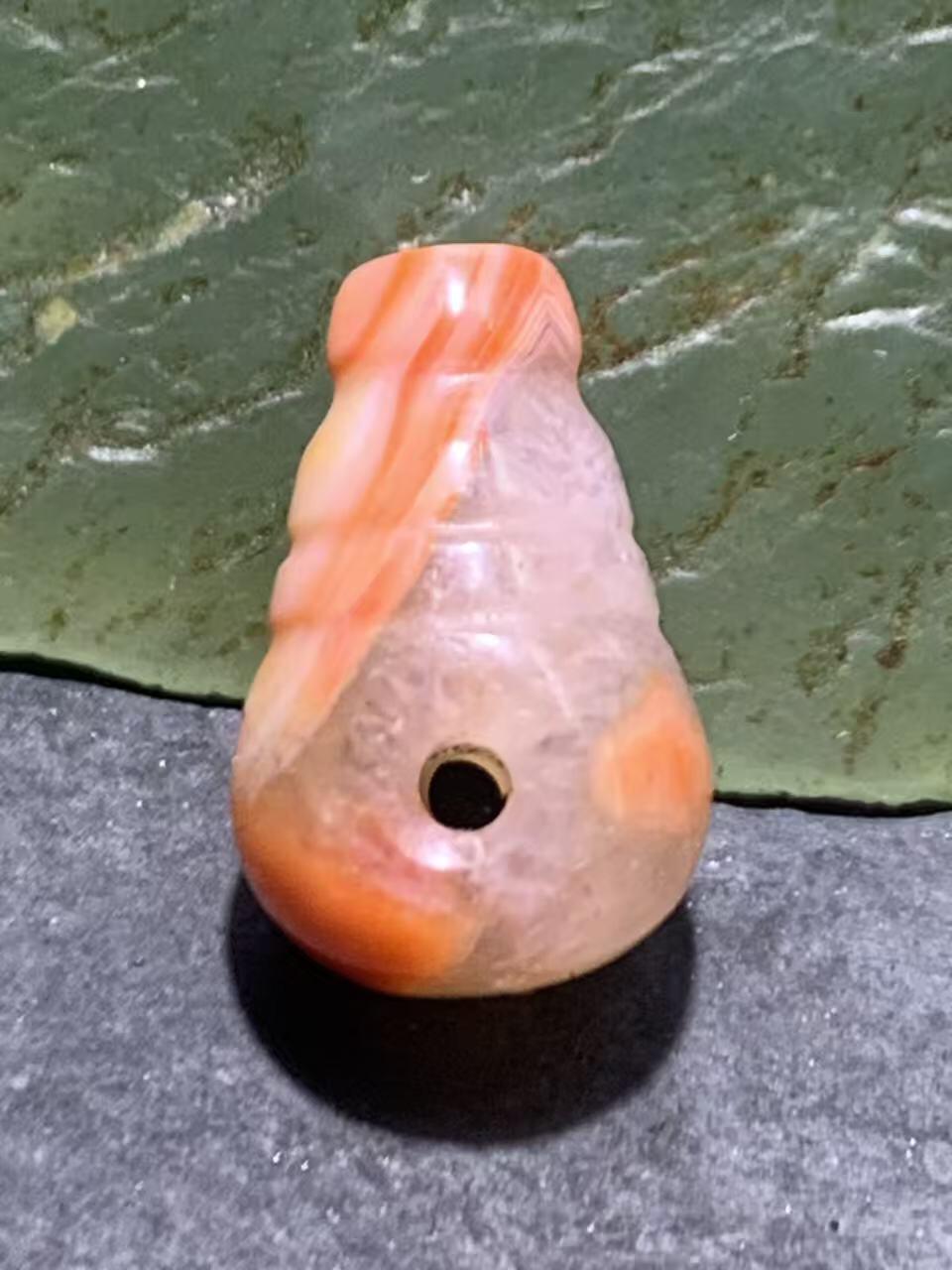 精美川料冰飘天眼纹南红玛瑙一体小佛头三通一个