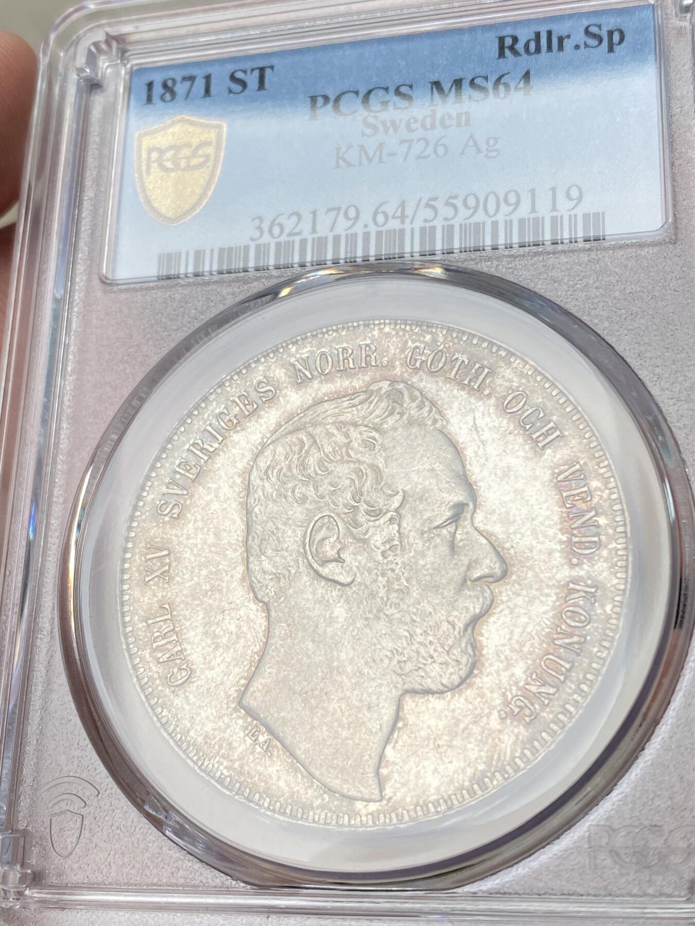万国钱币拍卖第060期（万国六十期纪念大拍） PCGS MS64 1871瑞典卡尔十五世双狮4达勒大银 好品罕见的北欧大银主币 双狮护盾的纹章设计也非常漂亮 原味转光欧陆五彩 PC唯一冠军分 洼地品种 顶级收藏品质