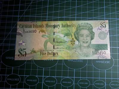 【炜奕收藏】，第五十八期，英属第三场 - 2018年开曼群岛5元，UNC品相，号码无47