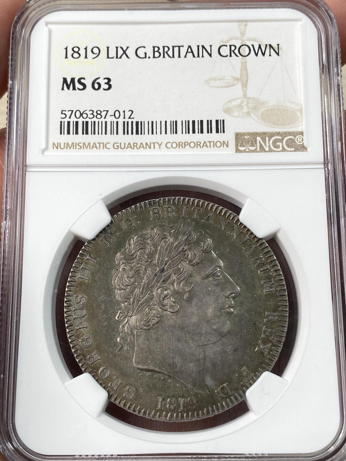 万国钱币拍卖第060期（万国六十期纪念大拍） NGC MS63 1819LIX英国乔治三世马剑克朗 英国马剑开山之作 厚重英伦绿五彩 国际市场越来越贵的大热门品种