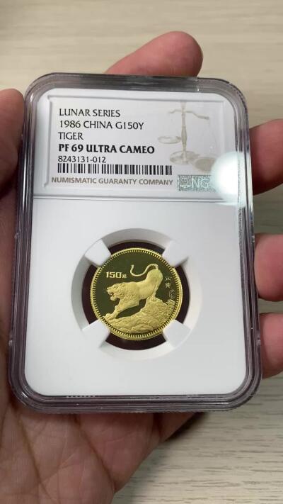 万国钱币拍卖第060期（万国六十期纪念大拍） NGC PF69UC 1986中国生肖系列丙寅虎年精制150元金币 精制喷砂深度镜面 8g 917金 原盒原证状态难得