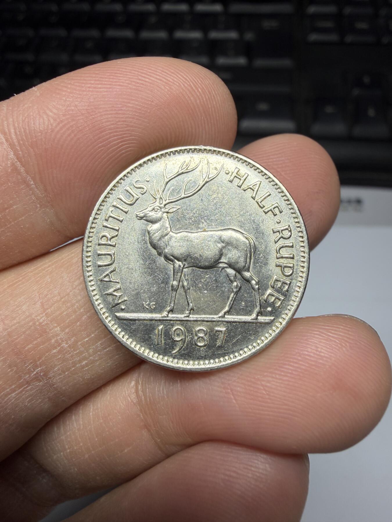 2025年集古藏今外币拍卖第二期-第1场—（总第301拍），可以寄存60天，满160元包邮。 1997年毛里求斯半卢比