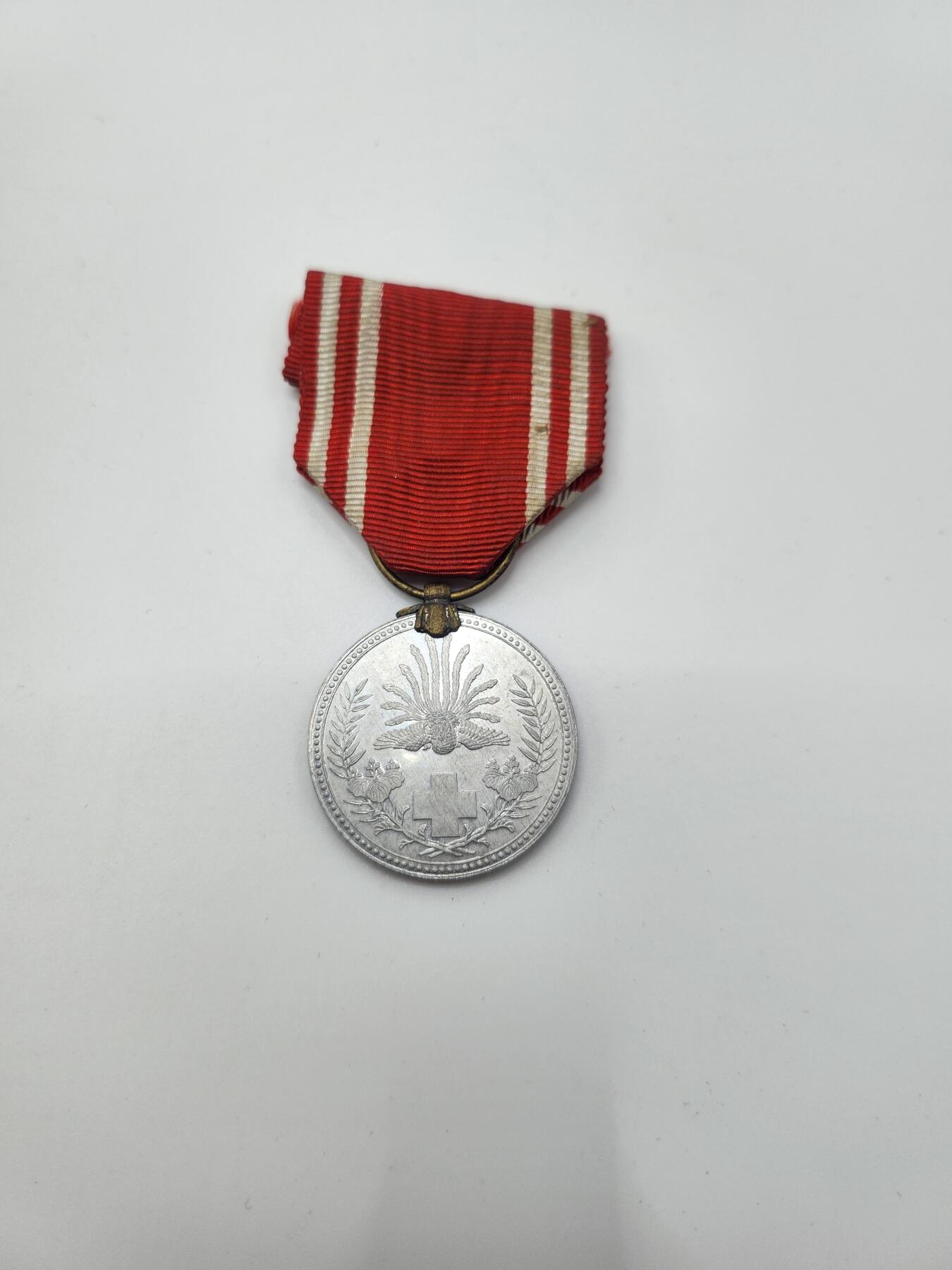 南水社首场拍卖 日本赤十字奖章 铝制 背面品相如图