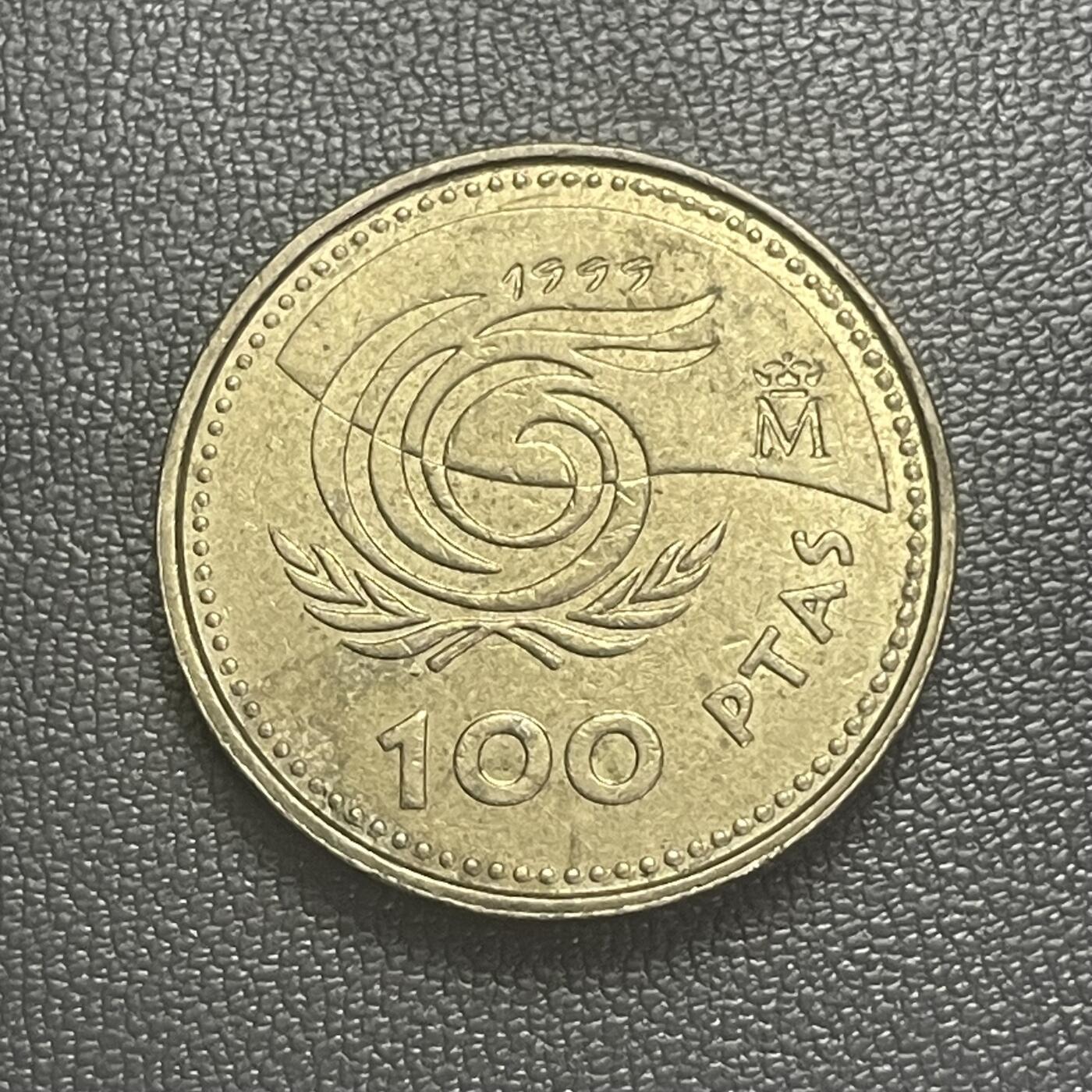 回流0201 西班牙1999年100比塞塔纪念铜币 国际老人年