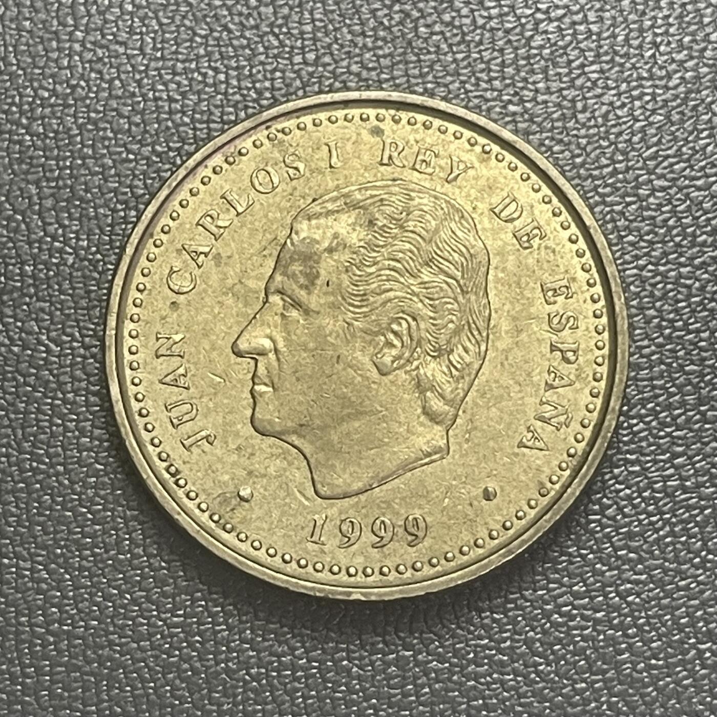 回流0201 西班牙1999年100比塞塔纪念铜币 国际老人年