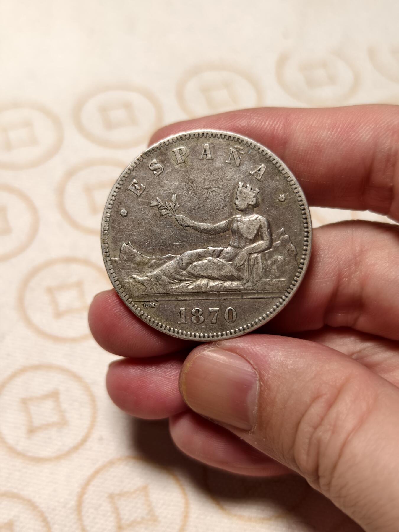 抚柳草堂-第十一期章牌钱币  奖章勋章限时免佣 满百包邮 放漏专场 1870西班牙5比塞塔拿花双柱银币 临时政府时期仅铸一年 重24.6g 整体状态不错