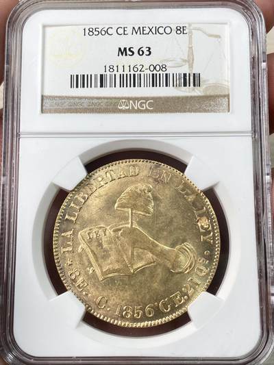 万国钱币拍卖第060期（万国六十期纪念大拍） - NGC MS63 1856C CE墨西哥金鹰8埃斯库多大金币 库利亚坎造币厂铸造 墨西哥鹰金质化后的观感令人爱不释手 极其经典的手持自由帽与宪法设计 原始黄金丝绸转光 极其优异的打制 鹰羽根根可数 NGC老盒顶级典藏状态