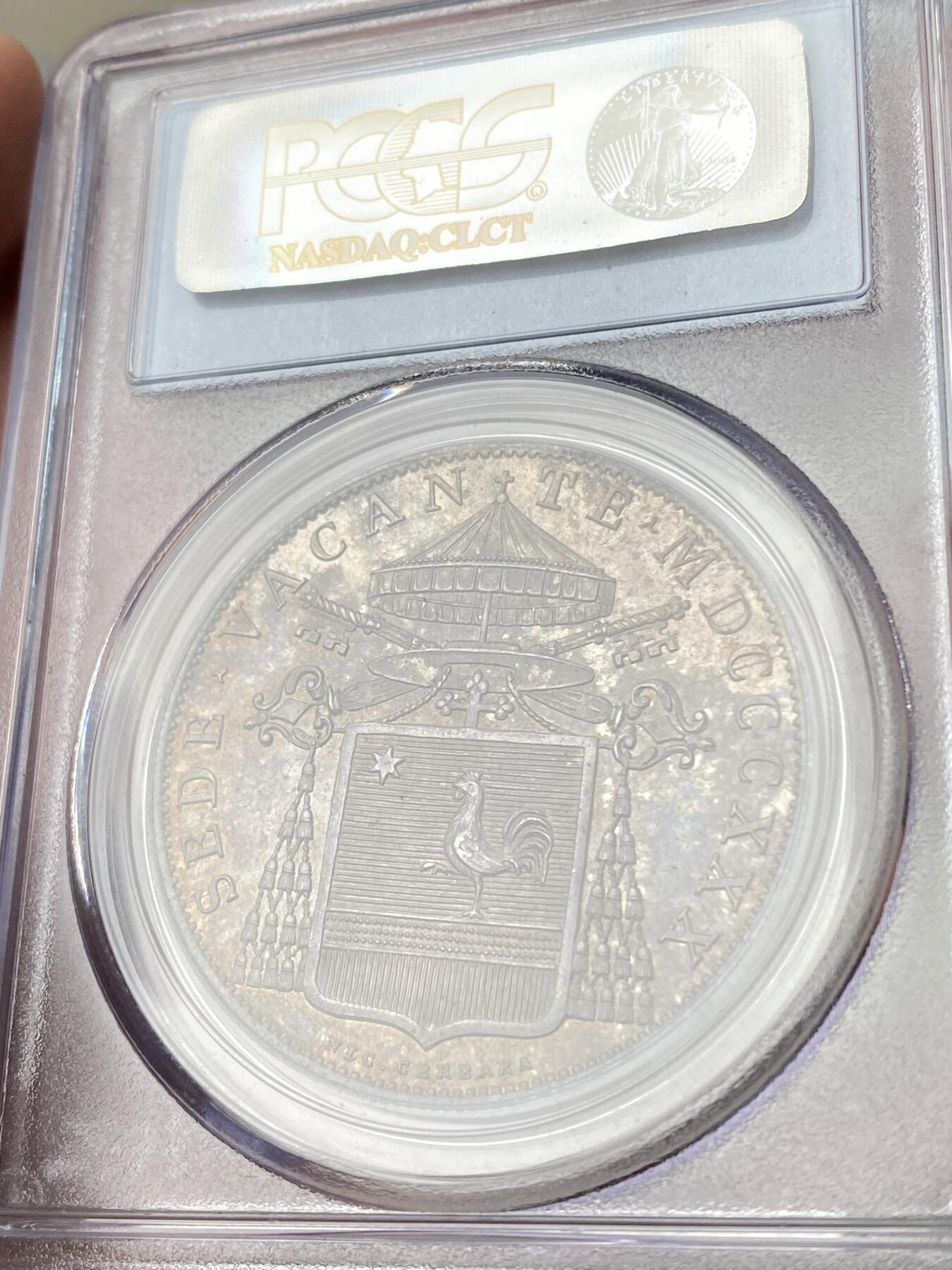 万国钱币拍卖第060期（万国六十期纪念大拍） PCGS MS64 1830年ROMA教皇国教宗缺位SCUDO大银 罗马造币厂铸 仅单年发行2860枚 近200年前教皇国工艺的巅峰之作 堪称完美的打制和通体熟美酱彩相得益彰 PC老白盒保存完好 PC亚军分更高仅一枚 一步到位的典藏级品质