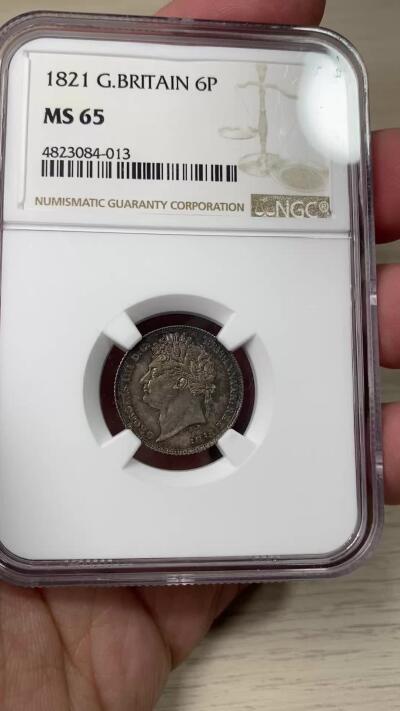 万国钱币拍卖第060期（万国六十期纪念大拍） NGC MS65 1821英国乔治四世三花6便士银币 英式华丽天鹅绒五彩初打类镜面质感 小中见大的顶级BU状态 典藏级品质