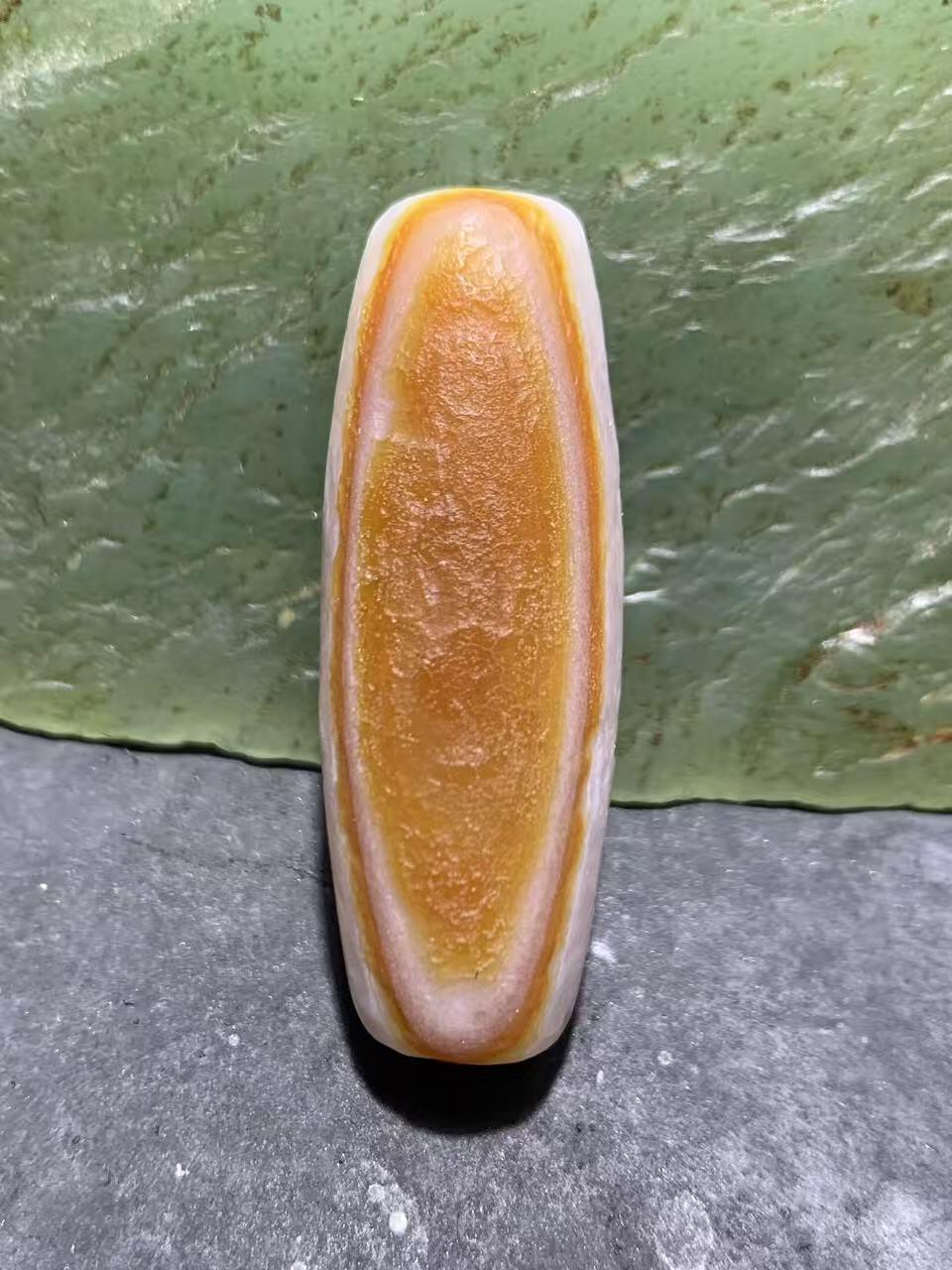 精美红白风化纹双天眼高玉化缠丝玛瑙桶珠一颗，