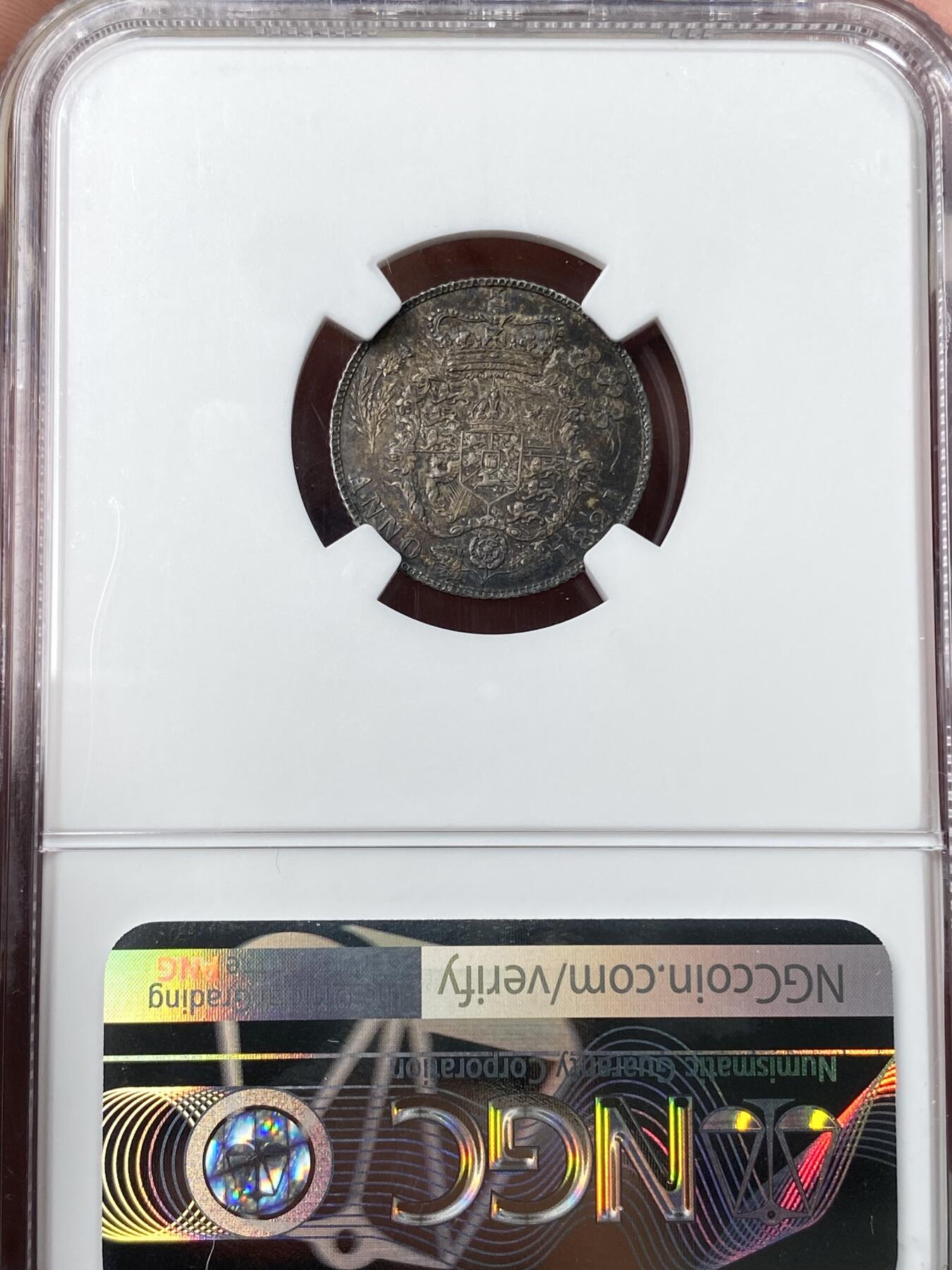 万国钱币拍卖第060期（万国六十期纪念大拍） NGC MS65 1821英国乔治四世三花6便士银币 英式华丽天鹅绒五彩初打类镜面质感 小中见大的顶级BU状态 典藏级品质