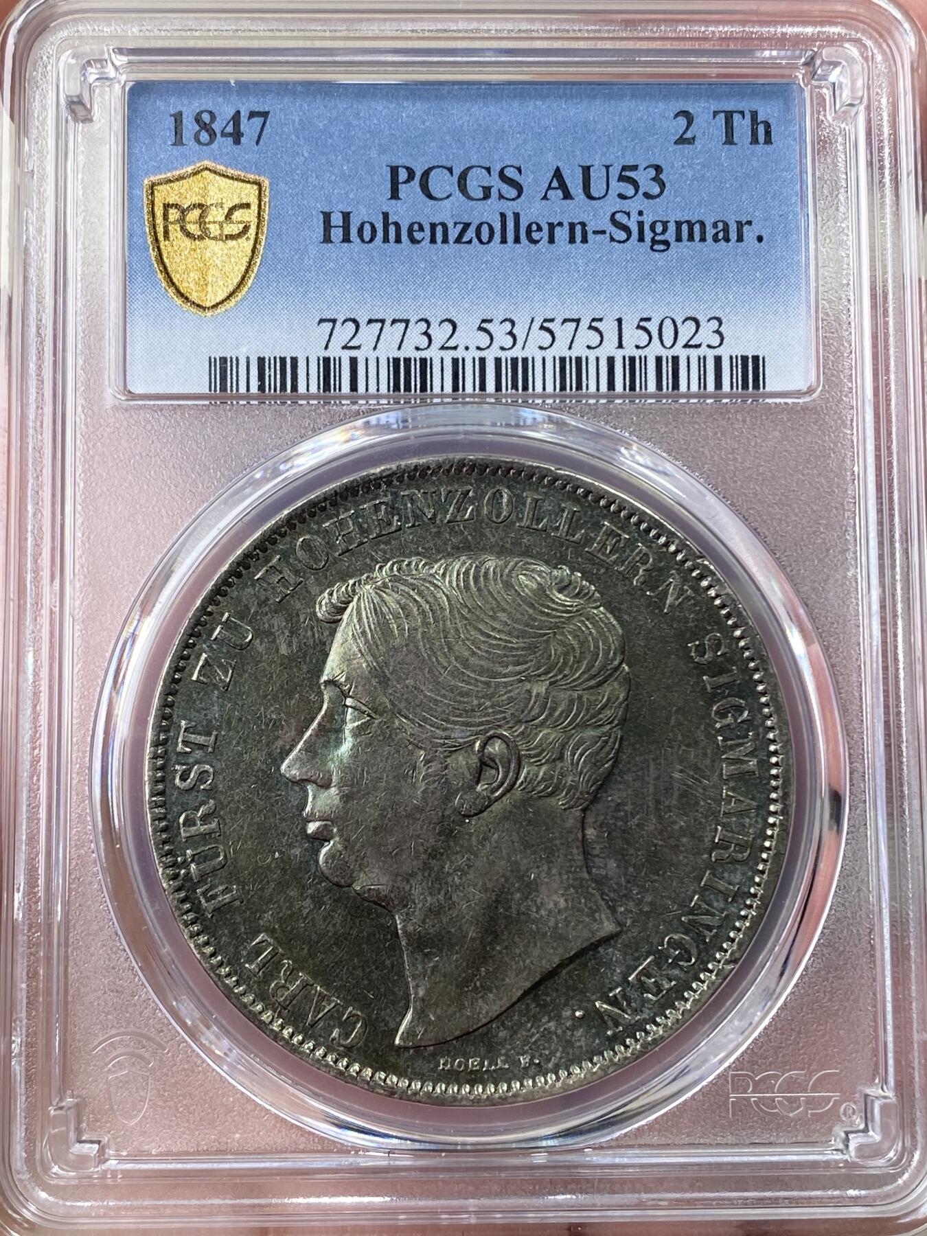 万国钱币拍卖第060期（万国六十期纪念大拍） PCGS AU53 1847德国霍亨索伦-西格玛宁根纹章2泰勒 邦国2t大名誉品种 1847关门年份 发行量仅2000枚 极具特色的纹章设计 双面厚重祖母绿包浆也难掩其底光迸发 观感远超分数的状态 收藏级品质