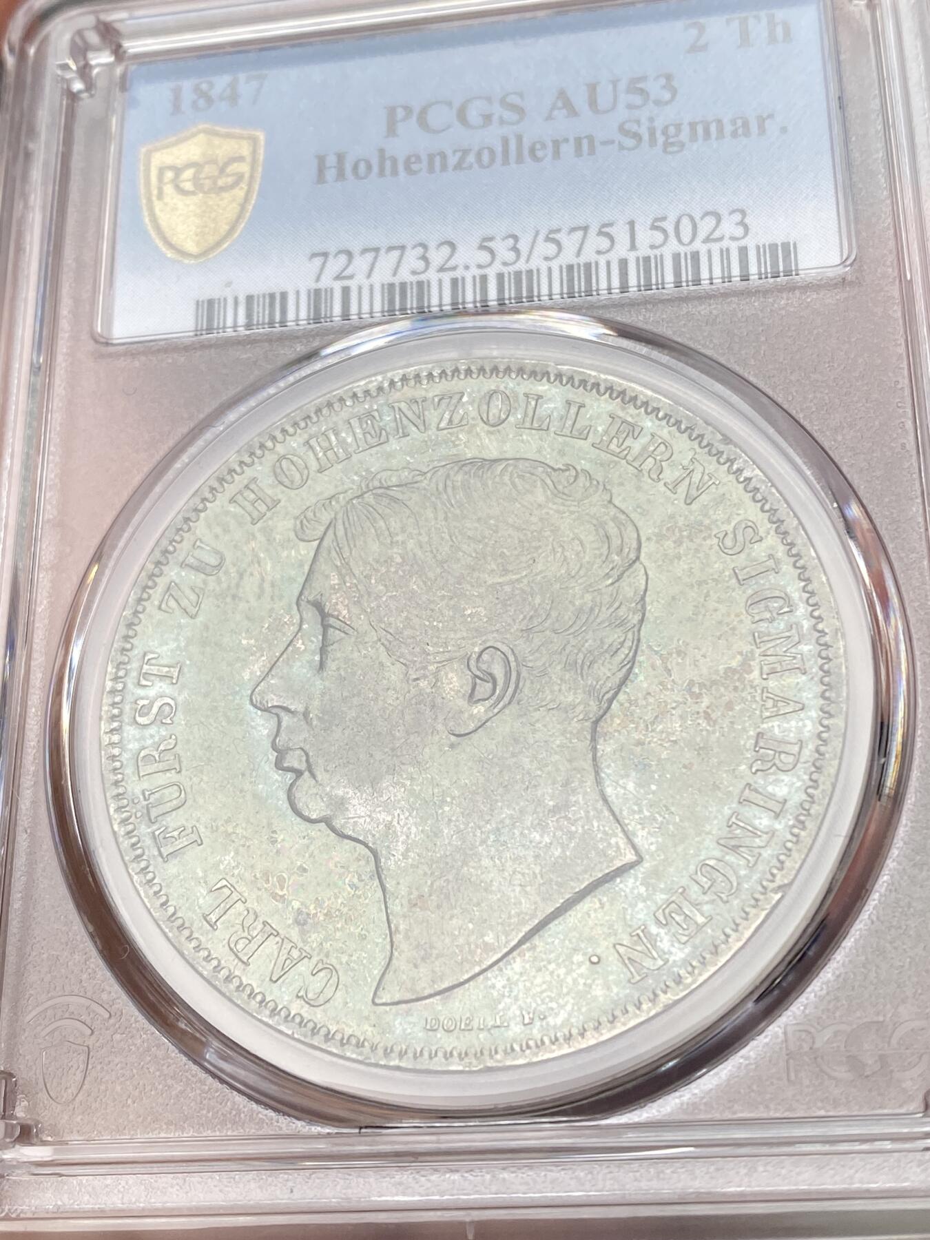 万国钱币拍卖第060期（万国六十期纪念大拍） PCGS AU53 1847德国霍亨索伦-西格玛宁根纹章2泰勒 邦国2t大名誉品种 1847关门年份 发行量仅2000枚 极具特色的纹章设计 双面厚重祖母绿包浆也难掩其底光迸发 观感远超分数的状态 收藏级品质