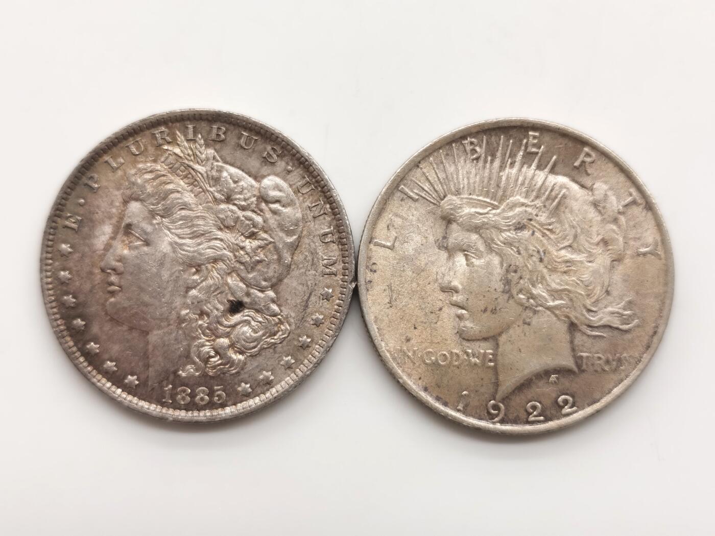 博洋堂世界钱币拍卖第159期（全场包邮） 美国1885年O版摩根银币+1922年和平银币一组2枚，双面黄油老彩+车轮转光