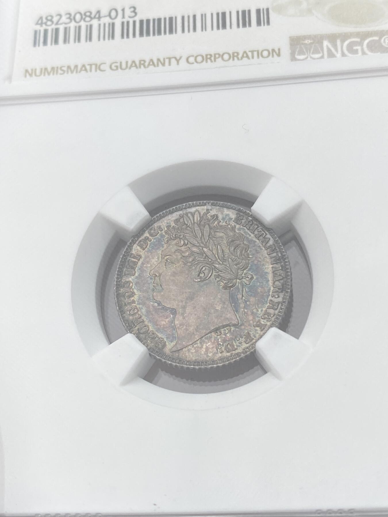 万国钱币拍卖第060期（万国六十期纪念大拍） NGC MS65 1821英国乔治四世三花6便士银币 英式华丽天鹅绒五彩初打类镜面质感 小中见大的顶级BU状态 典藏级品质