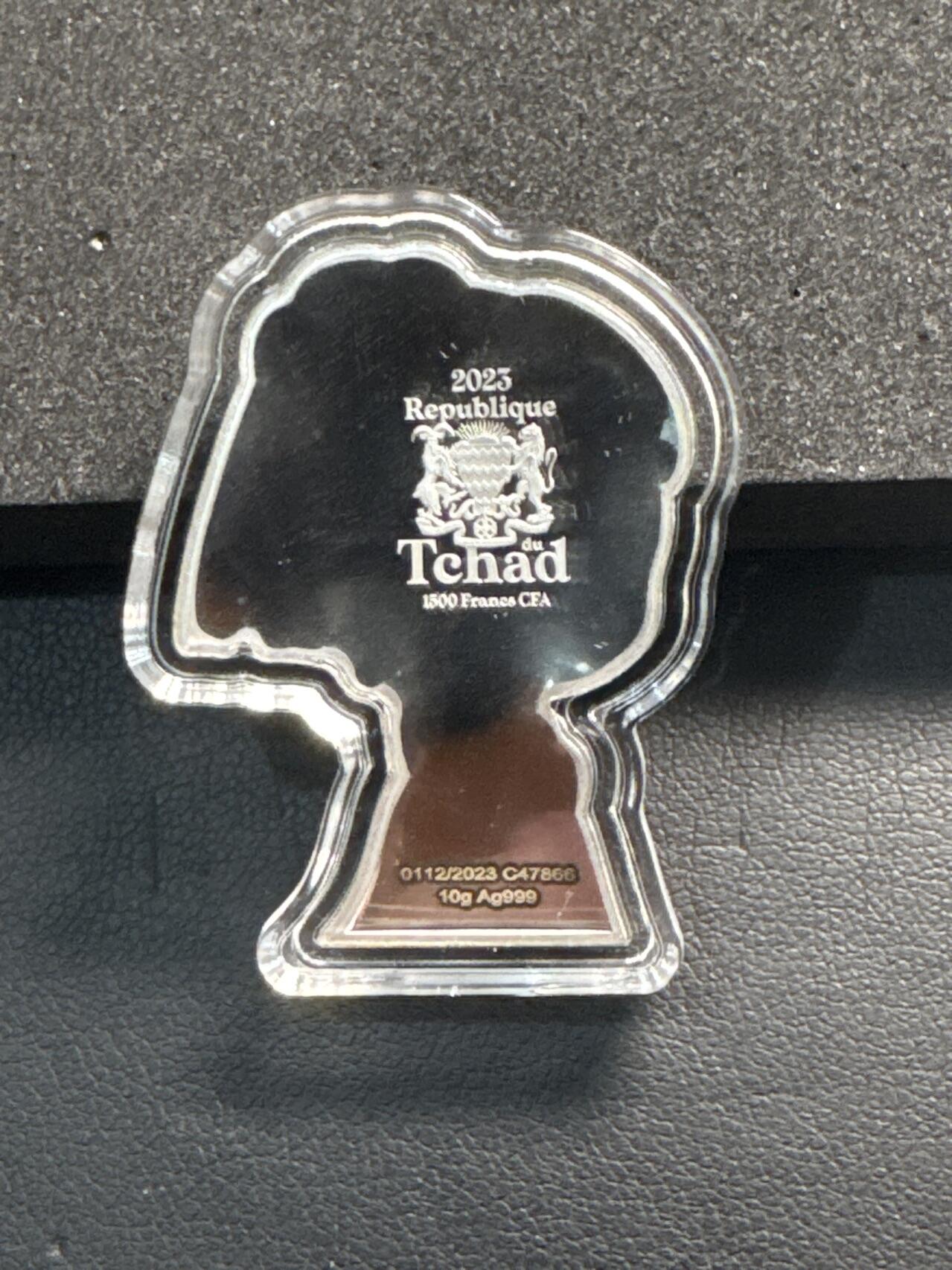 ❤️【币观天下】❤️ 第341期钱币拍卖- 2026.1.30周五晚上6点半场-长期征集拍品 春节前最后一场本场不能存放 节后恢复拍卖 乍得2023年卡通3D漫画戴珍珠项链的少女彩色异形银币10克（包装少个盖子）