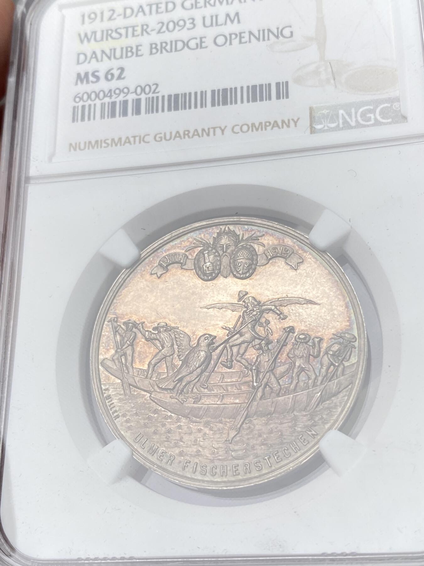 万国钱币拍卖第060期（万国六十期纪念大拍） NGC MS62 1912年德国乌尔姆在鹅门新桥开通之际举行的马上比武大赛纪念银章 乌尔姆城市景观和大教堂浮雕非常漂亮 镜面精铸虹彩极美