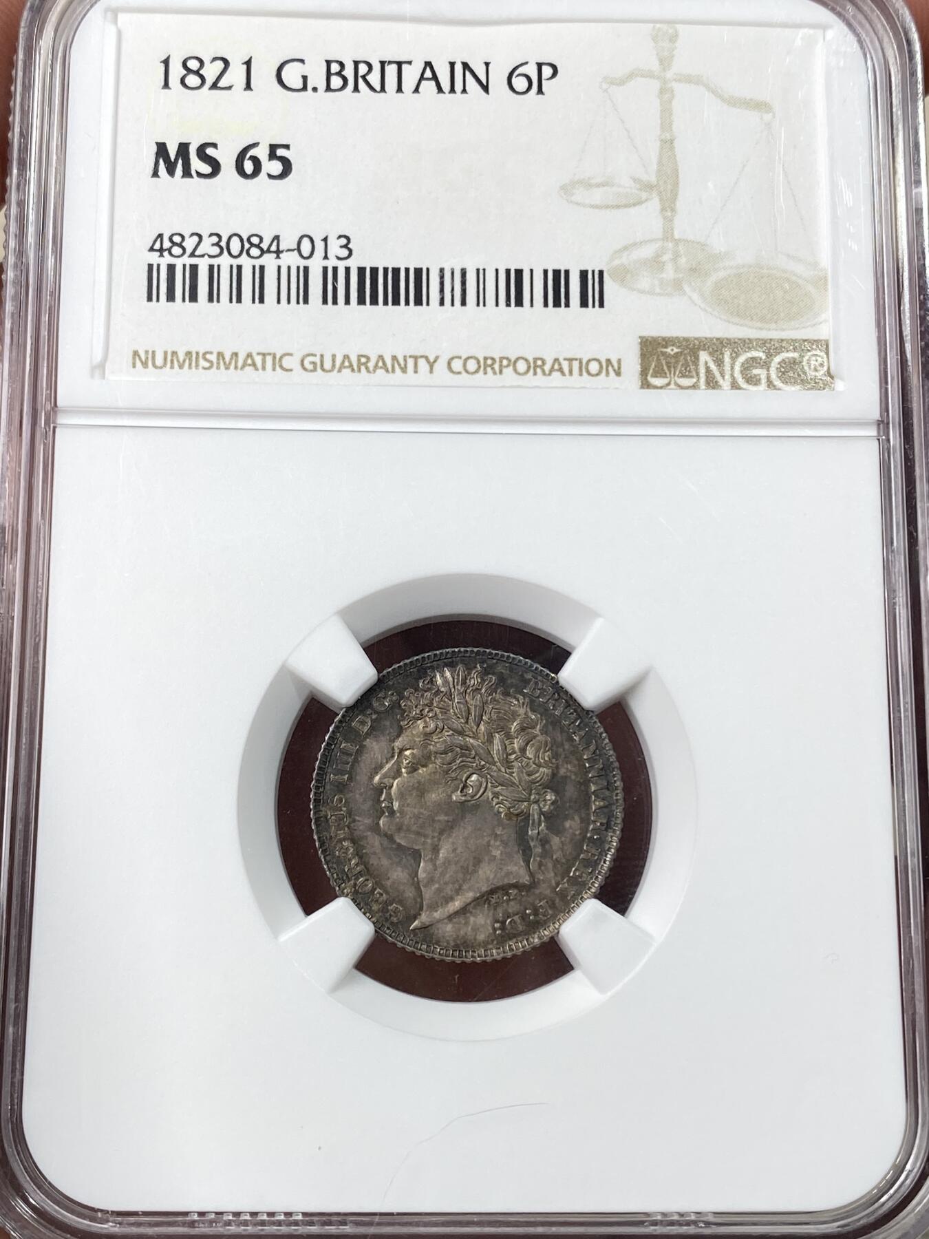万国钱币拍卖第060期（万国六十期纪念大拍） NGC MS65 1821英国乔治四世三花6便士银币 英式华丽天鹅绒五彩初打类镜面质感 小中见大的顶级BU状态 典藏级品质