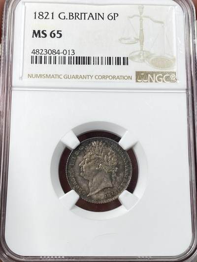 万国钱币拍卖第060期（万国六十期纪念大拍） - NGC MS65 1821英国乔治四世三花6便士银币 英式华丽天鹅绒五彩初打类镜面质感 小中见大的顶级BU状态 典藏级品质