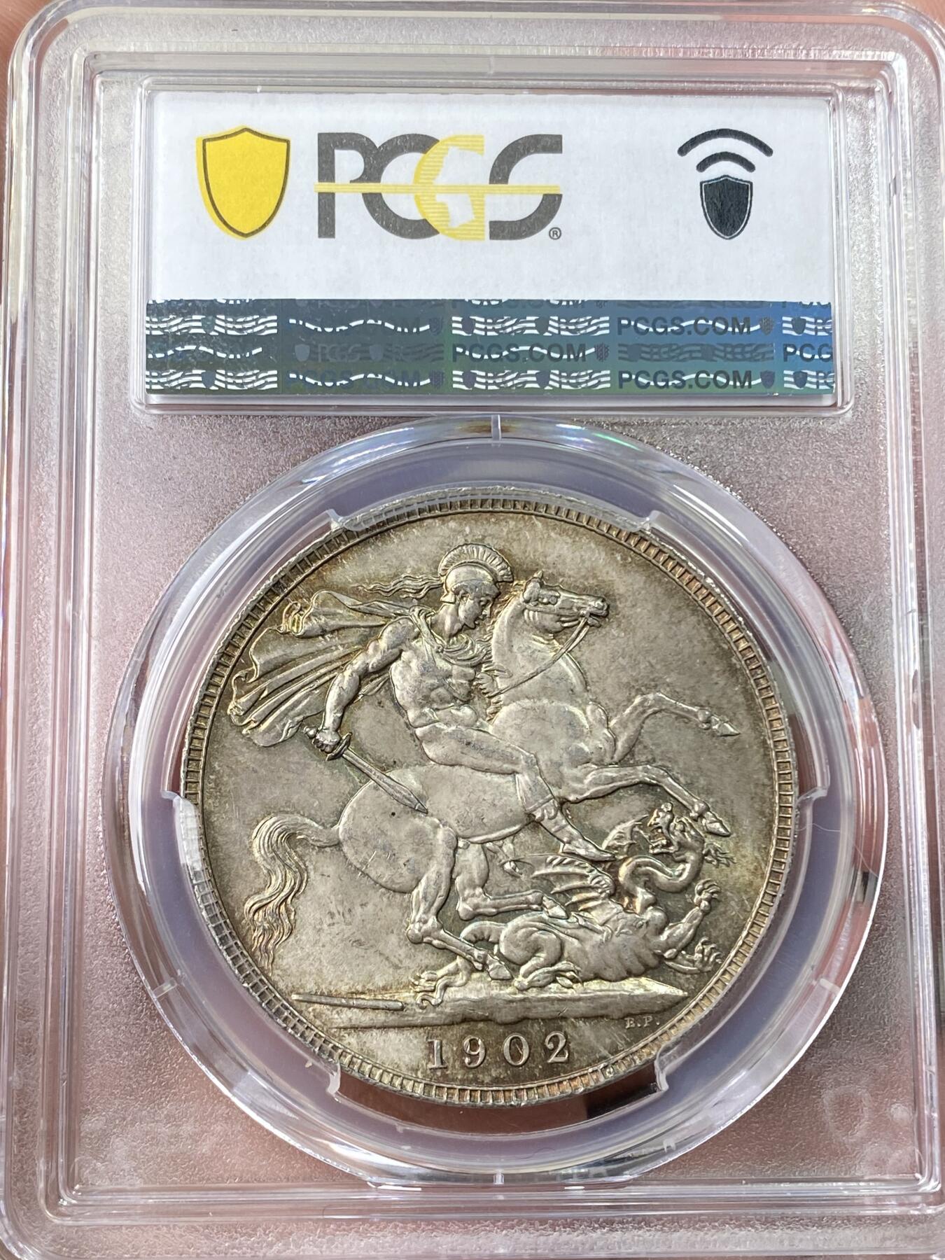 万国钱币拍卖第060期（万国六十期纪念大拍） PCGS MS64 1902英国爱德华七世马剑克朗 高分难度大于精制的流通品种 车轮转光底板在油画般的英伦五彩包浆加持下更添魅力 典藏级品质
