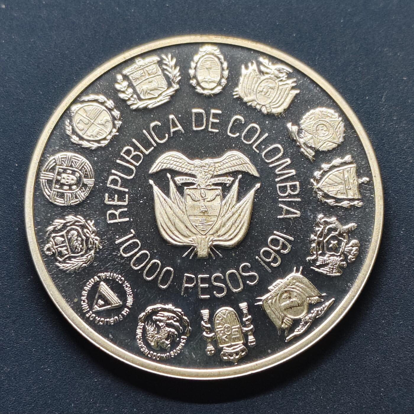 【全场包邮】纯粹捡漏拍499场-持续更新中 【伊比利亚美洲系列首套发现美洲500周年】哥伦比亚1991年10000比索精制纪念银币【40毫米27克92.5%，估算纯银价约699元（按28元/克银价核算）】