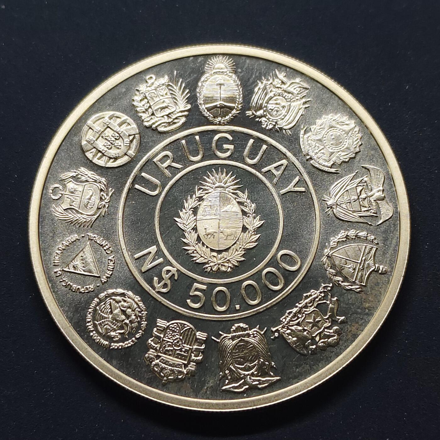 【全场包邮】纯粹捡漏拍499场-持续更新中 【伊比利亚美洲系列首套发现美洲500周年】乌拉圭1991年50000比索精制纪念银币【40毫米27克92.5%，估算纯银价约699元（按28元/克银价核算）】