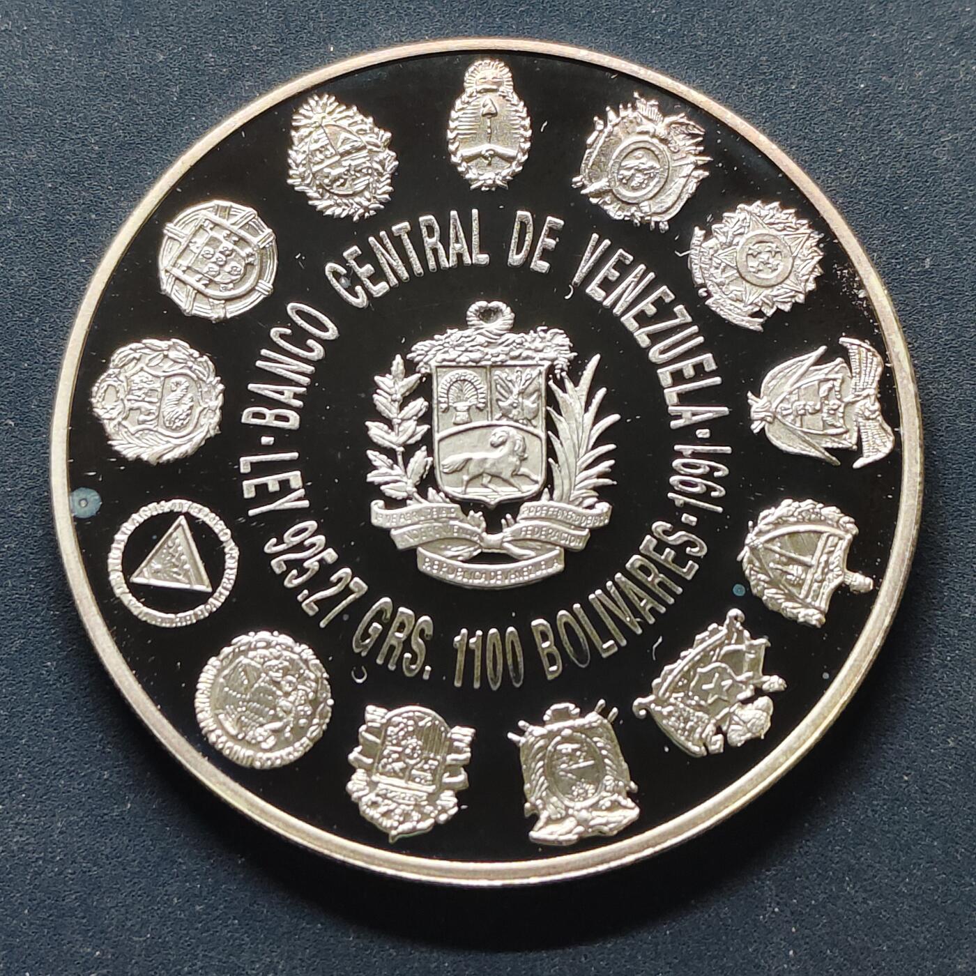 【全场包邮】纯粹捡漏拍499场-持续更新中 【伊比利亚美洲系列首套发现美洲500周年】委内瑞拉1991年1100玻利瓦尔精制纪念银币【40毫米27克92.5%，估算纯银价约699元（按28元/克银价核算）】