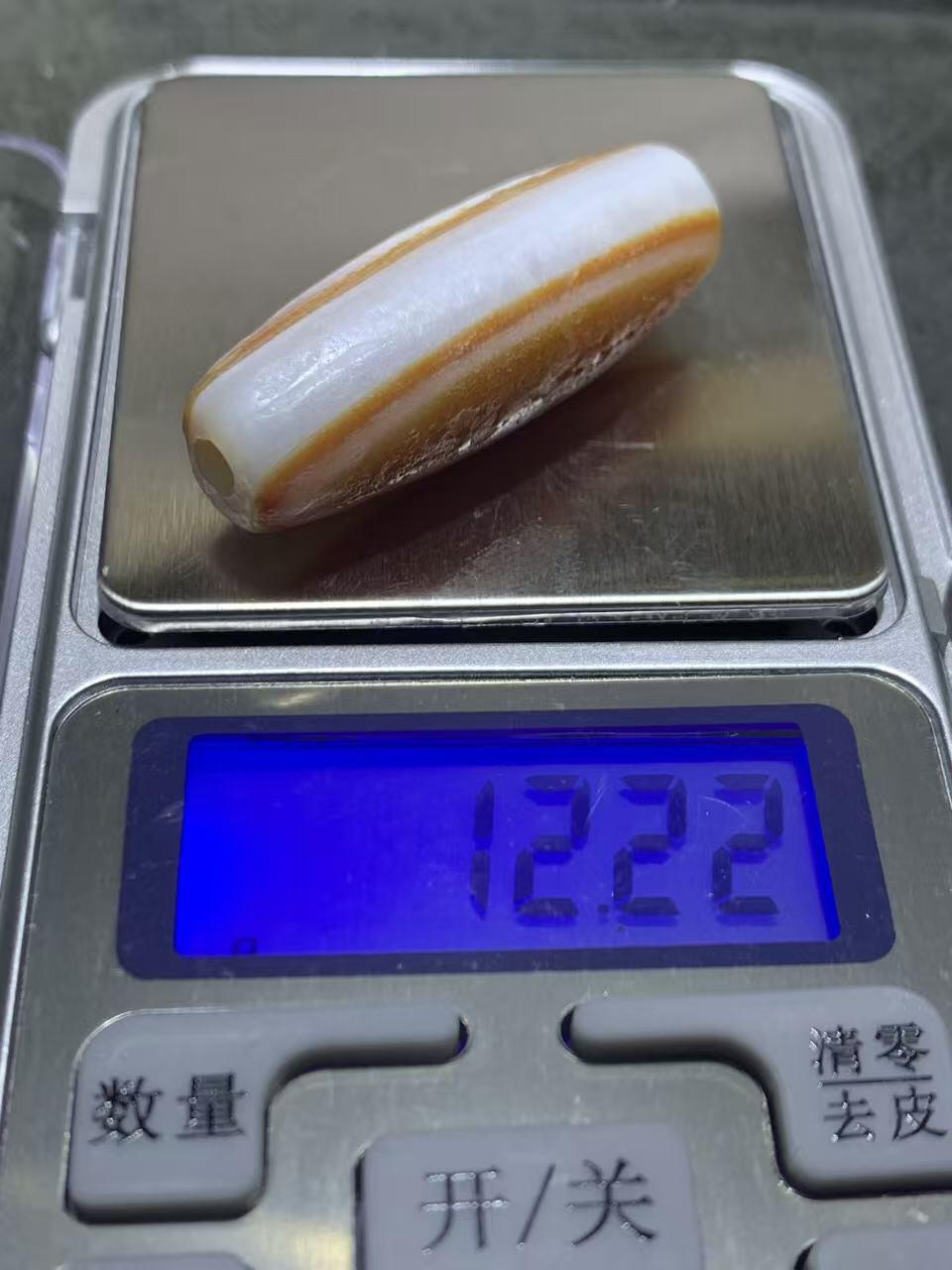 精美红白风化纹双天眼高玉化缠丝玛瑙桶珠一颗，