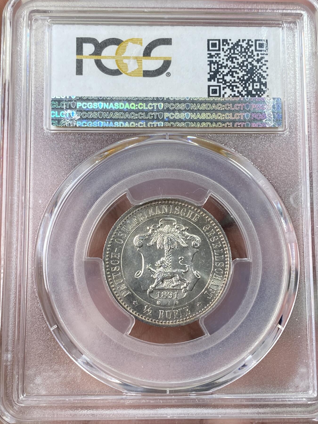 万国钱币拍卖第060期（万国六十期纪念大拍） PCGS MS64 1891德属东非威廉二世戎装1/2卢比银币 经典东非小狮子 银霜转光收藏级品质